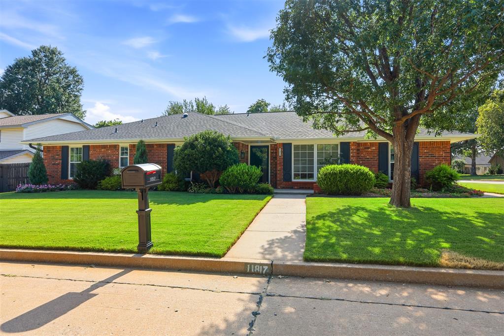 This is the one!! Welcome to this beautifully-maintained 2,498 square foot home in the desirable Warwick Estates, offering 4 bedrooms, 2.5 bathrooms, and a spacious 3-car garage. From the moment you arrive, you'll appreciate the exceptional curb appeal, highlighted by professionally completed landscaping across the entire front exterior. Inside, the thoughtfully designed floor plan features two generously sized living areas, providing plenty of space for both everyday living and entertaining. The kitchen is a standout with elegant white marble countertops, a stunning white and gold 6 burner Forte gas range, expansive counter space, and ample storage. Gold fixtures throughout the home add a refined touch, while the abundance of windows fills every room with natural light. The gorgeous sunroom offers the perfect place to relax year-round, overlooking a private and beautifully maintained backyard. With extensive storage throughout, quality finishes, and pride of ownership evident in every detail, this home offers the perfect combination of comfort, functionality, and timeless style. The community here is a dream, with a swimming pool, clubhouse, walking trails, tennis courts, stocked pond, playgrounds and more!! All of this located only minutes from Lake Hefner and around 20 minutes from Central OKC, Edmond, and Tinker AFB.