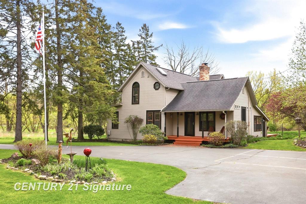 Welcome to your own private slice of heaven on N. Hemlock Rd. This beautifully updated and meticulously maintained farmhouse offers nearly 2,000 sq. ft. of living space on 10 serene acres-a rare and versatile property. Inside, you'll find an updated kitchen featuring handcrafted cabinetry, a formal dining area with stunning views, and a spacious great room anchored by a cozy pellet-burning fireplace. The south-facing solarium is perfect for plant lovers, while the main-floor bedroom adds convenience and flexibility. Custom touches like a built-in bar and hardwood floors enhance the home's warmth and character. Upstairs, a charming landing leads to two additional bedrooms, a walk-in closet, and a full bath. Step outside to enjoy the peaceful setting from the recently refinished deck. The property truly shines with its exceptional outbuildings, including a 3.5-car garage ideal for a workshop, a large barn previously used for horses, a smokehouse, and a finished studio/office space-perfect for remote work, hobbies, or entertaining. With endless possibilities and one-of-a-kind features, this property is not to be missed.