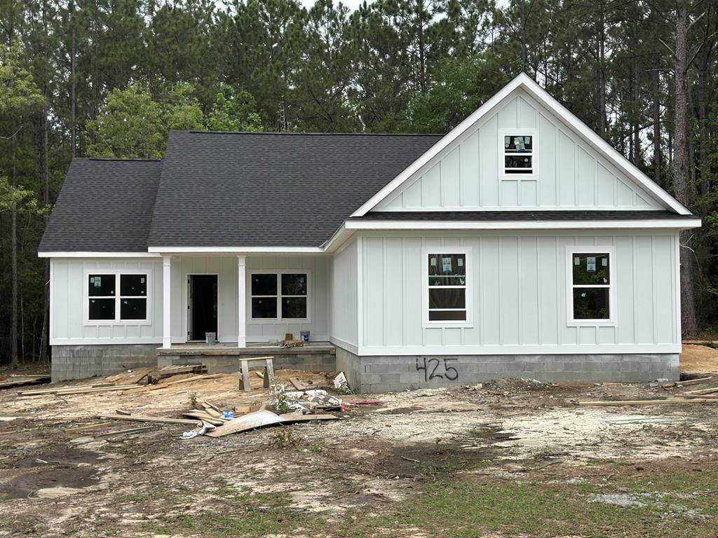 New construction homes featuring custom finishes in a great Cairo, Georgia subdivision. Conveniently located near Thomasville, Bainbridge, and Tallahassee. Three homes sit on 3-acre tracks, with two additional homes on a 1.5-acre tract. Covered patios and thoughtfully designed layouts offer modern living with plenty of space. Primary  bathroom includes a large tile shower and double vanities. Luxury Vinyl Plank (LVP) flooring runs throughout the home for durability and style. The kitchen showcases an abundance of cabinets, a kitchen bar, and granite countertops. Outdoor spaces include covered patios for comfortable outdoor living.