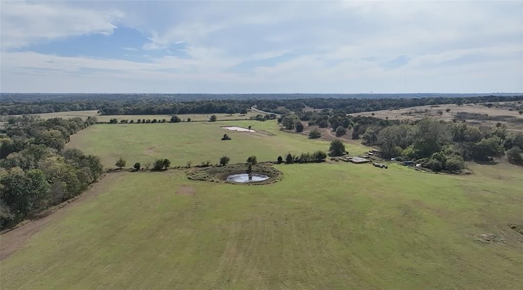 Exceptional investment opportunity awaits on this expansive 125+/- acre property strategically positioned at SE 179th Street and 60th Avenue NE in Oklahoma County. This remarkable parcel offers the perfect blend of pastoral beauty and development potential, with gently rolling terrain, mature tree lines, and picturesque Elm Creek meandering through the property. Currently zoned agricultural, this versatile land presents unlimited possibilities for visionary developers and investors. The property features a mix of open pasture land ideal for immediate agricultural use or future development, with natural water features including a pond and creek frontage providing both aesthetic appeal and practical benefits.