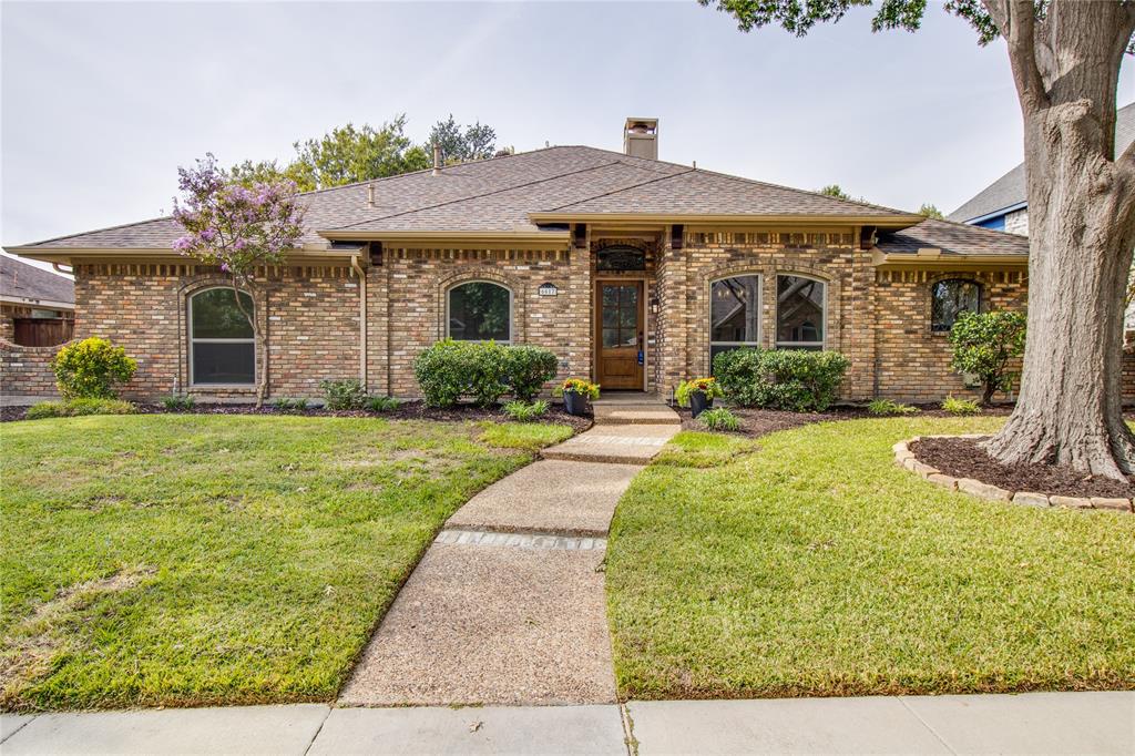Beautifully updated 4-bedroom, 2-bath home in a tranquil Plano neighborhood with no HOA! Offering 2,179 square feet, this inviting home blends distinctive architectural details with extensive professional renovations. Beautiful wood paneling enhances the living room, while wainscoting adds character to the den. Vaulted ceilings create an airy feel, and a double-sided fireplace connects these two gathering spaces. A corner wet bar in the den and a separate formal dining room make entertaining easy. The refreshed kitchen features all brand-new appliances, beautiful new quartz countertops, newly resurfaced cabinets, new brass hardware, and a new sink and faucet. The primary suite offers two walk-in closets and a remodeled bathroom with a new decorative tiled shower, matching tiled tub surround, dual vanities, new plumbing fixtures, and new lighting fixtures.New hand-scraped hardwood floors and textured carpet complement fresh interior paint throughout the entire home and complete removal of popcorn ceilings. New designer light fixtures, ceiling fans, and recessed lighting enhance the interior, along with new electrical outlets and switches throughout, including dimmers and GFCI outlets. Additional improvements include new door handles and locks throughout, a new front door, and nearly all new windows, including tilt-and-turn windows.Fresh landscaping adds curb appeal to the front yard and an inviting touch to the backyard. Enjoy outdoor entertaining on the covered backyard patio, complete with a ceiling fan for added comfort. A two-car garage adds everyday convenience. Thoughtful updates and timeless character make this home a standout!