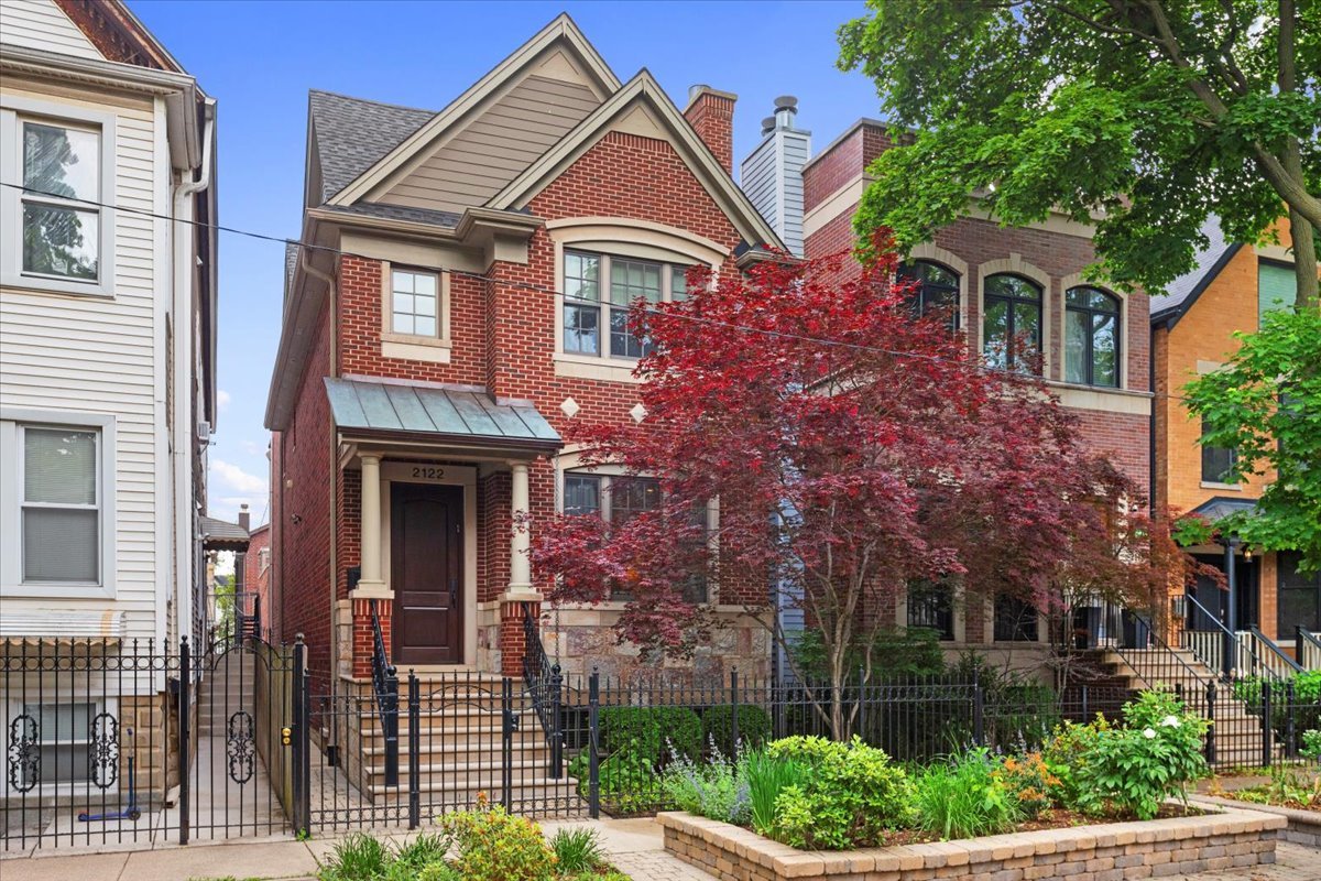 Your search is over!  Exquisite, highly upgraded and impeccably maintained custom-built solid brick and limestone home, on serene tree-lined, one-way street, in fantastic walk-to-everything location in the heart of Roscoe Village. Features great light, spacious rooms, an open layout, a thoughtful floor plan ideal for family living and entertaining, and stunning high-end finishes throughout. Gracious foyer opens to south facing, sun-filled living room w/ oversized windows and floor-to-ceiling French limestone wood burning fireplace, and separate dining room w/ beamed ceilings that easily accommodates a large table. Designer half-bath. Incredible professional grade chef's kitchen offers oversized full slab island w/ breakfast bar, walk-in pantry, sleek built-in desk, classic custom cabinetry, and high-end stainless steel appliances including Sub-Zero refrigerator/freezer, Wolf 48-inch six-burner oven/range and Bosch dishwasher. Huge great room off kitchen opens to deck for grilling, sport court and spectacular Trex deck w/ bespoke lighting over garage. Second floor offers 3 bedrooms and 2 baths, including luxurious primary suite w/ two professionally organized walk-in closets, and natural stone spa bath w/ dual vanities, jet tub, and big steam shower w/ rain shower head and body sprays. Rare third floor boasts a huge office perfect for working from home that opens to a sunny Trex roof top deck. Bright lower level w/ high ceilings, radiant heat & excellent light features recreation room w/ wine fridge and wet bar, 4th bedroom w/ walk-in closet and beautiful natural stone bath, wine cellar, laundry room w/ sink and side-by-side washer/dryer, and large separate storage rm. Gorgeous hardwood floors. Solid core doors. Custom millwork, window treatments, paint and designer lighting throughout. Zoned heat & air. 2-car garage w/ tons of storage. Unbeatable location steps to restaurants, cafes, shopping, groceries, parks, Starbucks, the "L" and all that Roscoe Village has to offer.