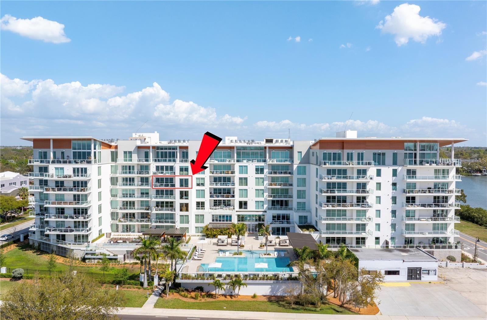 A Perfect luxury waterfront living experience with breathtaking views of water from the huge balcony to the living room, kitchen and the master bedroom. Located just below the penthouses with unobstructed views. The interior offers ceiling to floor windows with recessed lighting and a versatile bonus room or maybe office/den or a third bedroom. The gourmet kitchen offers Italian cabinetry and premium Gaggenau appliances, plus plenty of storage space. The primary bedroom offers a walk in closet and fabulous views of water, while the 2nd bedroom offers  a private en suite bathroom. Tow assigned parking spaces and additional storage for you odds and ends. Magnificent sauna and spa facilities and a modern equipped Gym. Please Contact Listing Agent for your personal tour through this beautiful condo.