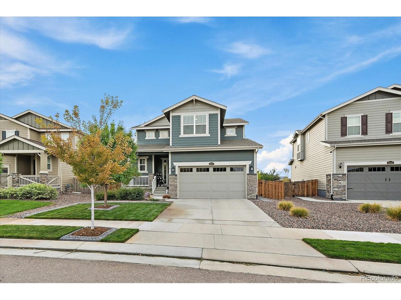 Your next home should feel like a getaway, and 10975 Wheeling Street delivers! Discover an exceptional combination of indoor comfort and outdoor entertaining in Turnberry. Built in 2020, this inviting residence offers 3,084 finished square feet, four bedrooms, four bathrooms, and a beautifully designed backyard on an 8,156-square-foot lot. Step inside to an open, light-filled main level where the living and dining spaces flow effortlessly into a spacious kitchen with a large island, abundant cabinetry, pantry, and a convenient built-in work area. Whether hosting friends or enjoying a quiet evening, the layout makes every day feel easier. Upstairs, retreat to a generous primary suite with a walk-in closet and private bath. Three additional bedrooms and an upstairs laundry room keep daily living comfortable and convenient. Then discover the home's true entertaining surprise: a fully finished basement with an expansive media and recreation area, electric fireplace, wet bar, and three-quarter bath. Imagine game days, movie nights, celebrations, or simply having a separate place to unwind. Outside, the raised deck offers room for outdoor dining and lounging beneath a pergola, all overlooking a spacious, beautifully maintained lawn with room to play, garden, and relax. Thoughtful spaces for work, play, and entertaining make this home stand apart. The attached two-car garage adds practical convenience. Enjoy the Turnberry neighborhood with nearby schools, parks, and access to shopping, dining, commuter routes, and Denver International Airport. From its inviting open floor plan to its impressive lower-level entertainment space and standout backyard, this home offers the room, flexibility, and setting buyers want. Put 10975 Wheeling Street on your must-see list and experience the possibilities in person!