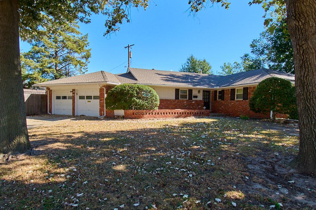 Welcome to Lakecrest Addition!  Just south of NW Expressway and NW 63rd, this well maintained home sits on a corner lot with a large front yard with plenty of shade trees.  The 4 bed/2 bath home has a large living room with parquet floors and a gas fireplace.  The home has a large galley kitchen with the dining are plenty of size for entertaining.  The large additional room just off the main living room could be used for an office/study/kids playroom. The back yard has a patio for entertaining with large side yard and also host the storm shelter.  All this home is waiting for is your person touch!!! Schedule your showing today!