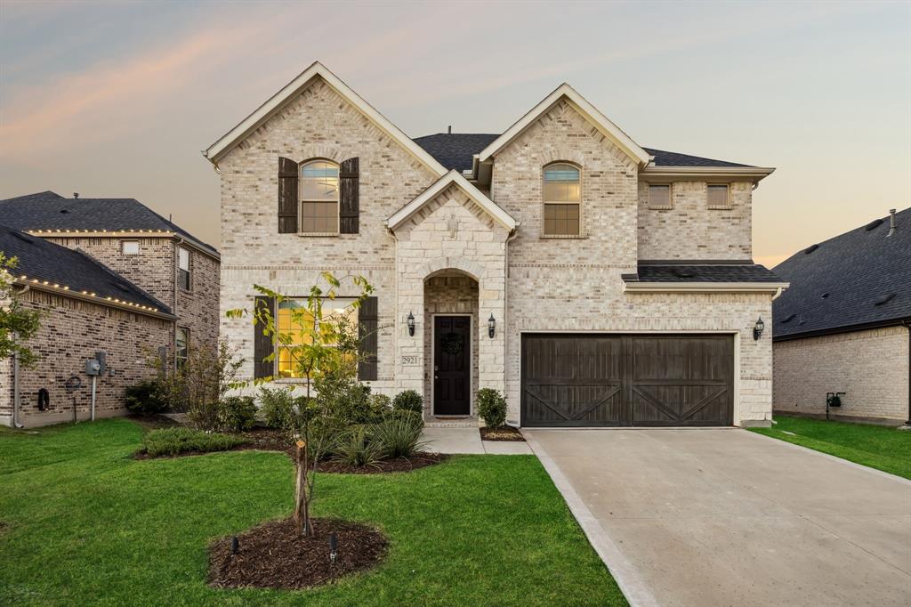 Welcome to 2921 Quinton Street, a beautifully designed home in the highly sought-after Lakewood community of Prosper. Zoned to Prosper ISD, this home offers unbeatable convenience — less than a mile from Rogers Middle School, about half a mile from Walnut Grove High School, and just a short walk to the Lakewood Amenity Center with its resort-style pool, clubhouse, fitness room, private park, and walking trails.

Inside, you’ll find a spacious open-concept floor plan that blends comfort and function. The kitchen features quartz countertops, stainless steel appliances, gas cooktop, and bright white cabinetry with modern hardware — all overlooking a large family room with high ceilings and abundant natural light.

The primary suite offers a peaceful retreat with dual vanities, a soaking tub, separate shower, and walk-in closet connected to the laundry room. A guest bedroom with a full bath on the main level provides flexibility for visitors or multigenerational living. Upstairs, there’s a large game room, two additional bedrooms with walk-in closets, and a shared Jack-and-Jill bath.

The backyard offers plenty of space for entertaining or future outdoor upgrades. Enjoy the Lakewood lifestyle with community events, scenic trails, and family-friendly amenities — all in one of North Texas’s most desirable school zones.