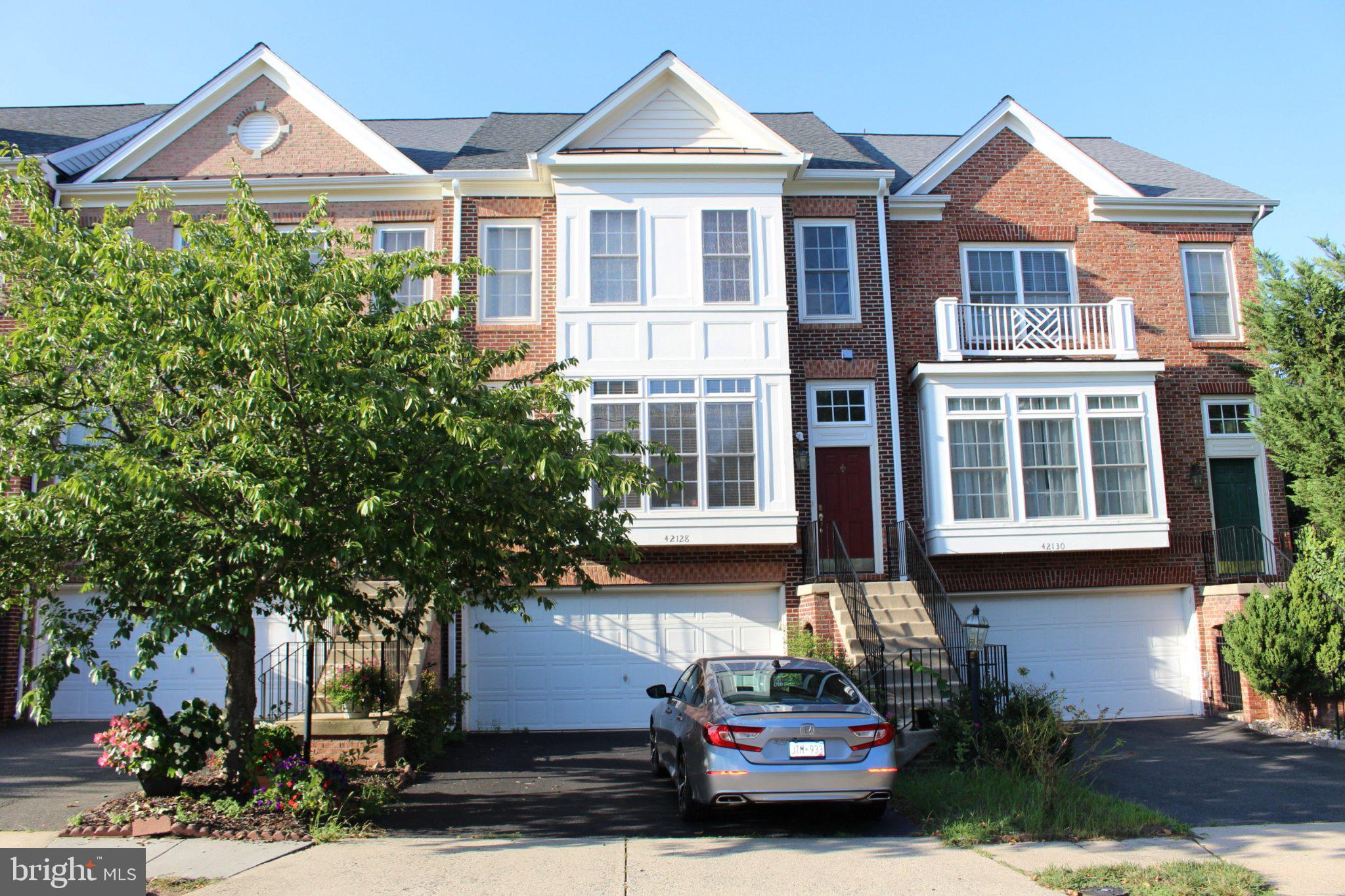 Discover the charm of this stunning townhouse nestled in the desirable Stone Ridge North community. Built in 2004, this beautifully maintained home boasts 2,287 square feet of thoughtfully designed living space, perfect for creating lasting memories. With three spacious bedrooms and four bathrooms, including two full and two half baths, this residence offers both comfort and convenience. Step inside to find a warm and inviting atmosphere, where the modern kitchen is equipped with essential appliances, including a built-in microwave, dishwasher, gas oven/range, refrigerator, and washer/dryer, making meal prep and laundry a breeze. The combination of luxury vinyl plank, tile, and carpet flooring adds a touch of elegance while ensuring easy maintenance. The Stone Ridge community is a treasure trove of amenities designed to enhance your lifestyle. Enjoy sunny afternoons at the community pool, challenge friends to a game on the tennis courts, or take a leisurely stroll along the bike trails. The clubhouse and fitness center provide excellent opportunities for socializing and staying active, while the tot lots and playgrounds are perfect for outdoor fun. The neighborhood is also surrounded by lush parks, offering ample green space for picnics, sports, and relaxation. With a strong sense of community, residents often come together for events at the community center, fostering connections and friendships. Conveniently located with easy access to major transportation routes, this home is just a short drive from shopping, dining, and entertainment options. The attached garage and driveway provide ample parking for you and your guests, ensuring that convenience is never compromised. This townhouse is not just a place to live; it's a lifestyle choice that embraces community, comfort, and convenience. Don't miss the opportunity to make this beautiful home your own and experience all that Stone Ridge North has to offer!