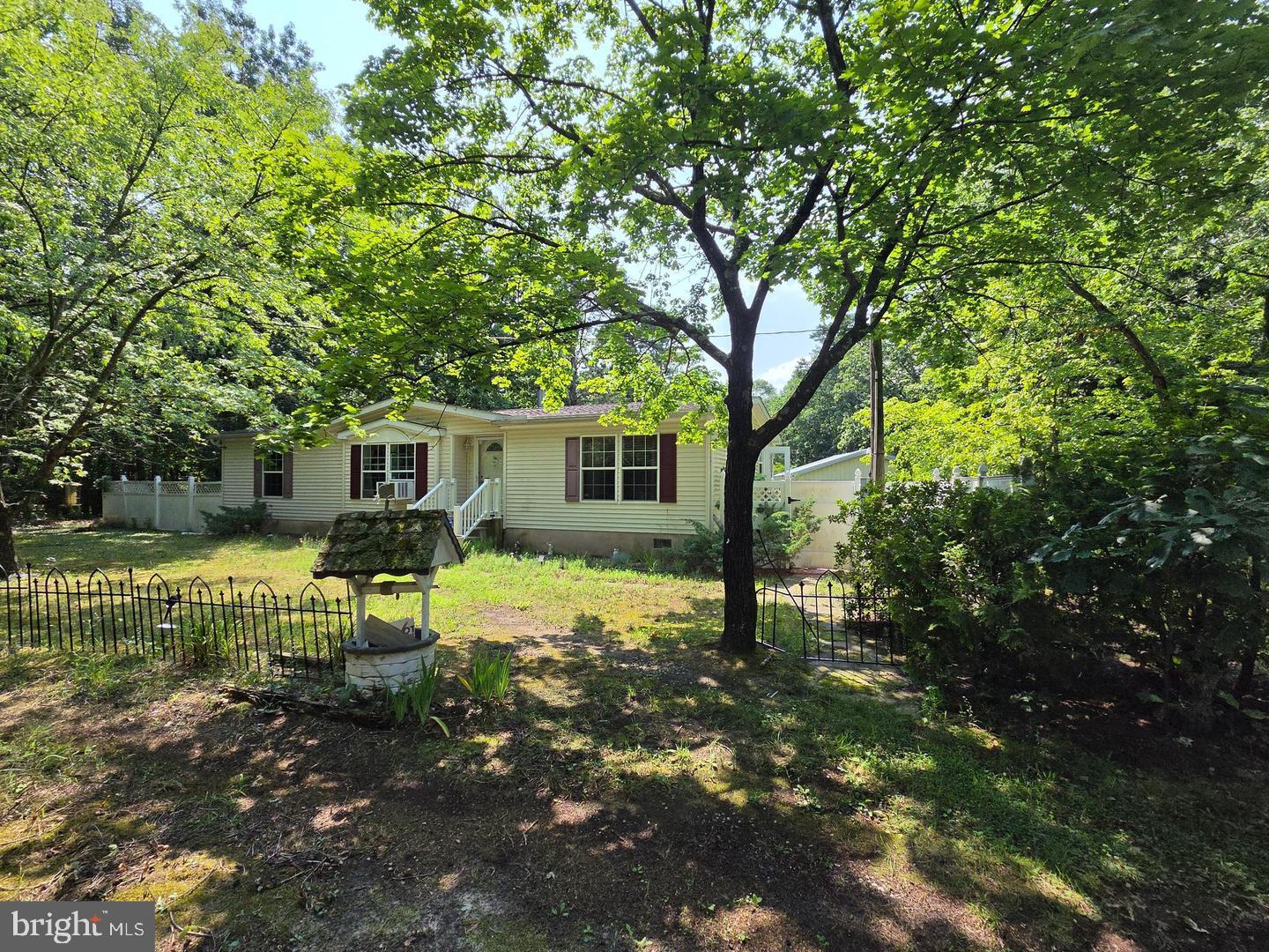 Alloway Township - Very nice, manufactured home built 2009 on 2+acre lot, 3-bedroom, 2-bath, open living room to dining area, w/wood burning fireplace. Private lot with detached oversized garage. The home is on a permanent cement foundation. Needs some outside landscaping maintenance and minor inside repairs.  Contingent on Seller finding suitable housing. Being sold as-is with Buyer responsible for CO, certifications and repairs. Great affordable opportunity for country living!