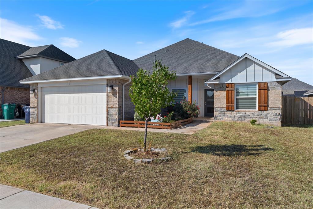 Welcome to this adorable home in Lone Oak! Enter into this beautiful open concept, split floor plan to the spacious living room and gorgeous kitchen area.  With large windows, cozy fireplace and wood-look tile throughout the main living spaces, it is bright and neutral and ready for your touch.
The kitchen features an oversized island with quartz countertops, white herringbone backsplash, 36” upper custom built soft close cabinets with under cabinet lighting, a farm sink, and a walk-in corner pantry. 
A study is located conveniently off the main entrance featuring a barn door for privacy when needed. 
The primary bedroom features a vaulted ceiling and ensuite bathroom which includes a separate shower, a garden tub and a large walk-in closet. Two other bedrooms and a bathroom round out this adorable home.
This beautiful home features stone work and wood on the front of the home, covered back patio and a great backyard! Lone Oak East is conveniently close to shopping and recreation areas while the neighborhood has its own pool and playground.