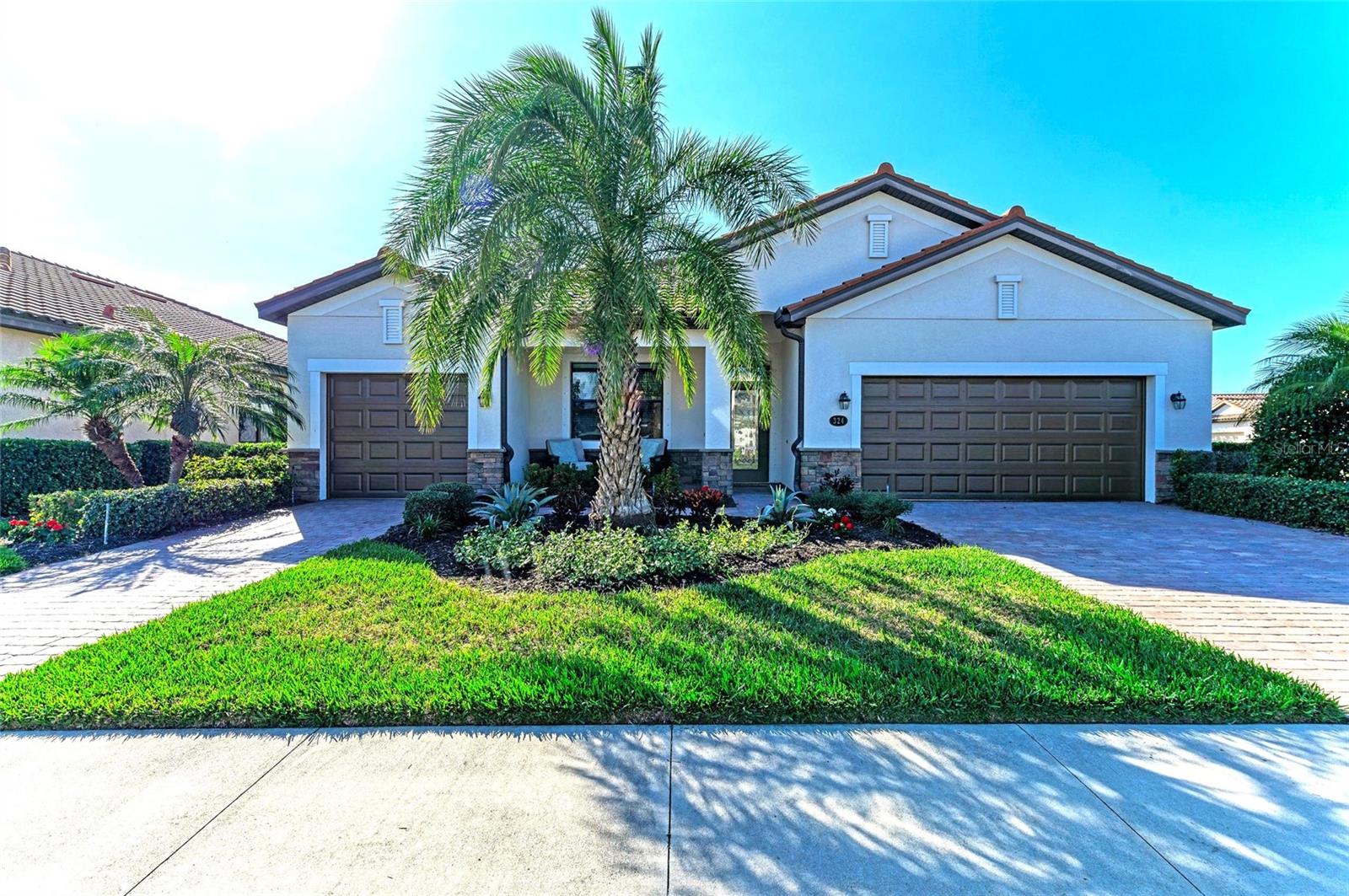 Sellers say, BRING OFFERS! if you’re looking for VALUE in an AMENITY-RICH community, you have found it. This LOVELY & SPACIOUS home has the updates that count, and one of the LOWEST DOLLAR per square foot of any home in River Strand Golf and Country Club! Updates include AC replaced in 2022, a newer refrigerator and dishwasher, custom vanity added in the primary bathroom, all new custom landscaping surround this house for beautiful Florida views as well as a custom patio for you to sit out and soak up the sunshine while appreciating the corner view of the water. The exterior has been power-washed and the garage doors have been recently painted giving this home an A+ in curb appeal.  Another benefit, if you’re not a huge golfer, this home is located in the Sanctuary section of River Strand which means you won’t be paying the extra fees for the golf, but you do have the ability to pay to play golf based on availability. You still get all the amenities which River Strand is known for as well as the fantastically convenient location. River Strand Golf & Country Club is a warm and friendly community with a 27-hole Arthur Hills designed golf course which has been recently renovated by Andrew Green, 9 Har-Tru Tennis Courts, 8 Pickleball courts, 2 Resort-Style Pools, 6 Satellite Pools, Clubhouse with restaurant, social events, Community Center & 2 fitness centers in this luxury gated community with 24 hr. security, lawn maintenance, cable & internet included in your HOA fees.  Convenient location to I-75, University Town Center, airports & beaches PLUS Costco & coming soon will be Target, Hobby Lobby, Whole Foods and Chic-Fil-A!  River Strand Golf & Country Club More than a Community, It’s a Lifestyle.