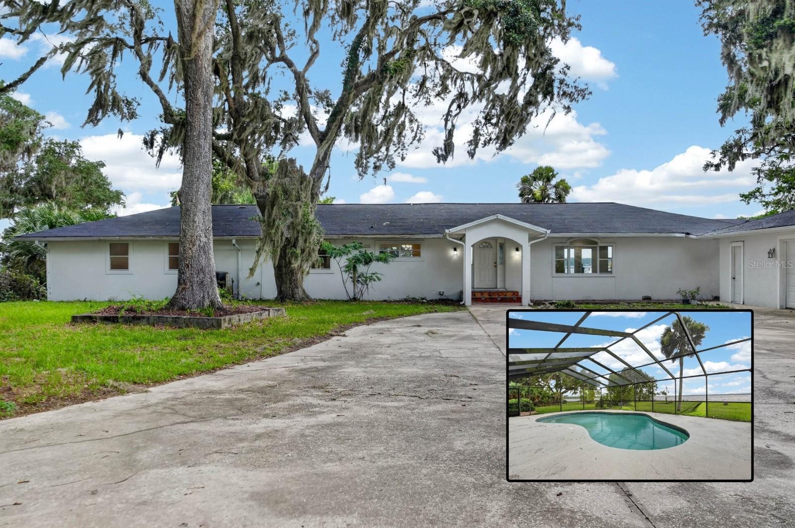 Imagine pulling onto 1.63 private acres, the St. Johns River stretching wide across the back of the property and roughly 265 feet of shoreline that's yours alone. Step inside and 3,092 square feet open up around you. With four generous bedrooms and three full baths, the floor plan has a natural rhythm -- a private primary retreat at one end and room for the kids or guests to have their own wing at the other, so no one's ever tripping over each other. Out back is where life here happens. The pool invites long Florida afternoons and easy entertaining, while the river beyond sets a serene, ever-changing backdrop you'll never tire of. And there's room for everything -- a boat, an RV, a trailer, plus an oversized three-car garage with a workshop area. Privacy, acreage, and a coveted spot on the St. Johns River, all for the buyer ready to trade the subdivision for a waterfront life of their own.