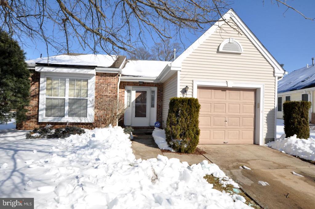 Holiday Village East is one of South Jersey’s premier 55+ communities, and this sought-after Englewood model could be the perfect fit for your next chapter. Offering over 1,400 square feet of comfortable living space, this home features 2 generously sized bedrooms and 2 full baths, thoughtfully laid out for both everyday ease and effortless entertaining.Tucked quietly at the back of a cul-de-sac, the setting offers a little extra privacy and a lot less traffic. The one-car attached garage provides convenience and direct access, while the home’s open design creates a natural flow from the foyer straight through to the bright and inviting sunroom—perfect for morning coffee, a good book, or simply soaking in the peaceful surroundings. With no immediate neighbor behind, you’ll enjoy a calm, private backyard experience that feels like your own retreat.Life at Holiday Village East is about more than just a home—it’s about lifestyle. Residents enjoy a vibrant, active community with countless social clubs, events, and activities to match just about any interest. The clubhouse serves as the heart of it all, featuring a fitness center, refreshing pool, and gathering spaces where neighbors quickly become friends. From game nights to hobby groups to the occasional organized trip out of town, there’s always something happening—yet never any pressure to do more than you’d like.Comfort, community, and low-maintenance living all come together here, offering the kind of easy lifestyle that lets you spend more time doing what you enjoy most.