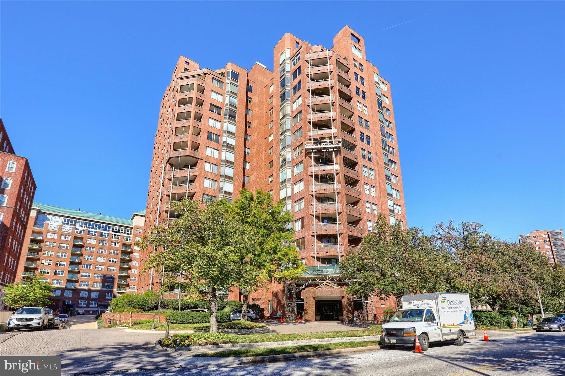Welcome to The St. James, where full-service convenience meets spacious, light-filled living in one of Baltimore's most esteemed neighborhoods. This beautifully maintained 2-bedroom, 2.5-bath residence offers approximately 1,630 square feet of comfortable living space with generously sized rooms, abundant natural light, and a layout that lives exceptionally well. The large living and dining areas are ideal for both everyday living and entertaining, while expansive windows and a private balcony offer treetop views and wonderful natural light. The kitchen features ample cabinet and counter space, updated finishes, and a bright eat-in area. Both bedrooms are well-proportioned, with updated en suite bathrooms and ample closet space. In-unit laundry, a hall powder room, and two designated parking spaces add to the convenience of living at #306. Residents of The St. James enjoy a secure, professionally managed building with elevator access, an elegant lobby, doorman service, a community pool, and an exercise room. A rare opportunity to enjoy easy, low-maintenance living in one of Baltimore’s most sought-after communities.
