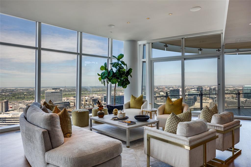 Sophisticated custom home located on the desirable North side of Museum Tower with jaw dropping views of downtown, Klyde Warren and Uptown.  A private elevator ride delivers you directly to your home.  Kitchen offers Meile appliances, wine tower and abundant storage. Floor to ceiling windows w motorized shades. Large primary w wrapping terrace,  Sky room and large open living dining areas.