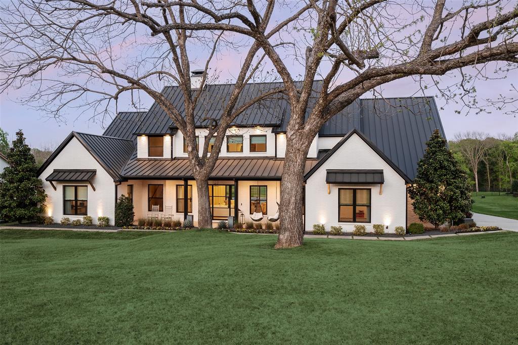 Welcome to a true sports and golfer’s paradise at 1411 Red Oak Trail in Fairview, perfectly situated in the highly acclaimed Lovejoy ISD. This one-of-a-kind estate combines luxury living with an unparalleled athletic lifestyle, offering something for every sports enthusiast in the family. Inside, the home boasts 5 spacious bedrooms plus a dedicated office, an open and light-filled floor plan, and a chef’s kitchen that flows seamlessly into the main living and entertaining spaces. The primary suite is a private retreat, complete with serene views, a spa-like bath, and generous closet space. Every room is designed to maximize comfort, functionality, and style. Step outside to your private backyard oasis. Completely turfed and professionally landscaped, it features an expansive chipping and putting green, a private driving range, and a short course option—perfect for golfers looking to practice their game at home. For indoor athletics, the heated and air-conditioned 6-car garage is a dream come true. Designed to accommodate basketball, pickleball, batting cages, hockey, or a full home gym, it allows you to train, play, and entertain year-round regardless of the weather. Located just minutes from shopping, dining, and major commuting routes with easy access to Highways 121 and 75, this property perfectly blends convenience, luxury, and a resort-style lifestyle. Whether you’re entertaining friends, practicing your swing, or training for your favorite sport, this estate is an unmatched retreat for families who love life in motion. If you’ve been searching for a home where luxury meets passion, athleticism, and a love for golf, 1411 Red Oak Trail is the ultimate sports and lifestyle destination.