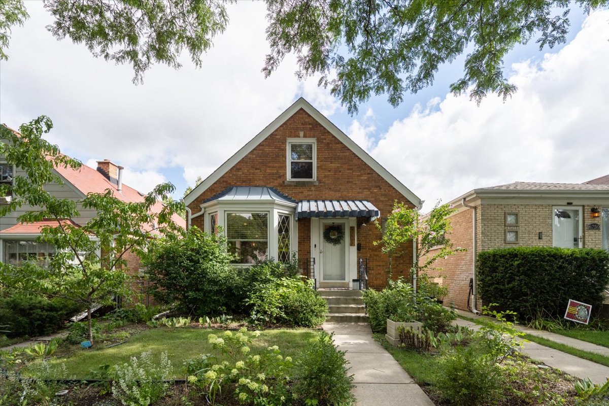 Incredible opportunity to own a fully renovated, highly upgraded 3 bedroom + office, 2 bath single family home on a quiet, tree-lined street in Norwood Park. Over the course of their ownership, the current owners have made timeless updates to the home - inside and out. A front pathway leads you through a beautifully landscaped front yard, up a set of brand-new front steps and railings. Once inside, the open floor plan, with hard-wood floors throughout the main level, lends itself well to both entertaining and comfortable living. The spacious living/dining room has a bay window overlooking the front yard and has ample space for two seating areas. The dining area can easily accommodate a dining table for six. The living space flows seamlessly into the kitchen, which was refreshed in 2021 with quartz counters, new backsplash, new stainless-steel appliances including a gas range, hood, and dishwasher. The refrigerator was replaced in 2018. Two large, sun-filled bedrooms with ample closet space are also located on the main level along with a full bathroom. The bathroom was renovated in 2022 and features custom glass, Kohler toilet and sink fixtures, and a deep soak tub/shower with a safety door that swings both ways to preserve bathing small children. The primary suite occupies the entire second level of the home. The landing at the top of the stairs has three large closets including a custom shoe & accessories closet by California Closets. The graciously sized bedroom easily fits a king-sized bed with room to spare and a closet designed by California Closets. Renovated in 2022, the ensuite bath features custom glass, a new upstairs ventilation system, a new window, and Kohler toilet, shower, and sink fixtures. The fully finished lower level has 8 ft ceilings and is the perfect place for recreation, game tables, a playroom, or to house overnight guests. The office is the perfect place to work from home and features beadboard paneling, sconces, and a glass door. A separate laundry room has a Maytag washer and dryer, both new in 2018. A full drain tile system with sump pump and wall membranes was installed in 2016 and has a fully transferable warranty with Permaseal and there is a backflow protection flood control system. The backyard is an urban oasis and features a brick paved patio, an electric awning from Hanso Home, a cedar privacy fence (new in 2020), a flowering Cherry Blossom tree, and plenty of space to garden, play, and relax. A detached 1-car garage has been upgraded with all-new electric and a separate breaker panel. New roof (home and garage), flashing, gutters, and siding on upstairs dormer and garage were installed in 2021, the chimney and front limestone were tuckpointed in 2023, new water heater and furnace (2023), and all plumbing has been updated from galvanized to copper. Smart Home Features include doorbell, Yale lock, thermostat, smoke detectors, and the home is wired for AT&T Fiber internet. Ideally located within the Garvey Elementary district (CPS) and within close proximity to Immaculate Conception School, you can walk to parks, playgrounds, public transit, and all Norwood Park has to offer. This home is conveniently located near the expressway, but ideally nestled on a quiet street with very little traffic. Welcome home!