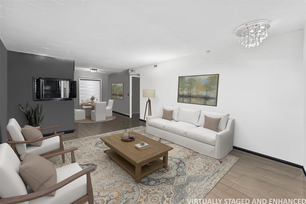 Charming and Unique Condominium with Modern Touches - Discover this delightful condo just 1.5 miles from the turnpike/Memorial and close to fantastic shopping options (like Living Spaces), restaurants, and more. This well-cared-for condominium boasts a blend of modern updates and charming retro details, making it a truly unique find. Step inside to find newer carpet in both spacious bedrooms, offering a cozy and inviting atmosphere. The bathroom features stylish, well-maintained black and white retro tiles complemented by a newer vanity and a striking black toilet that adds character. Recent renovations, including fresh paint throughout and the removal of the popcorn ceiling, provide a clean, contemporary feel. A standout feature of this unit is the cleverly converted half bathroom, transformed into a functional laundry room—a rare find in this building that adds convenience to daily living.The open layout of the large living room and dining area create an ideal space for relaxation and entertaining. The galley-style kitchen offers just the right amount of space with a window overlooking the private, fenced-in back patio, which is a perfect spot for outdoor dining or morning coffee. This patio is a true asset that offers more enjoyment and privacy than the upstairs balconies. This condominium is more than just a place to live—it's a canvas for your lifestyle. Are you ready to make it yours? The seller has chosen a starting price that prioritizes a quick sale over getting every last penny. Call for your tour today!