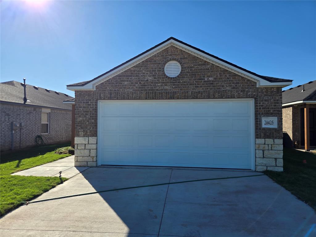 Welcome home to this beautifully designed 4-bedroom, 2-bathroom single-story home in the sought-after Antler Creek community, zoned for the highly desirable Deer Creek school district! Built in 2026, this like-new Lennar home offers 1,460 square feet of thoughtfully designed living space with an open-concept layout connecting the kitchen, nook, and family room — perfect for entertaining or everyday living. The gourmet kitchen is a true showstopper, featuring a large center island, gas range, elegant quartz countertops, and an impressive walk-in pantry with plenty of storage for all your culinary needs. Durable hard surface flooring flows throughout the main living areas, while each bedroom is equipped with a ceiling fan for year-round comfort. Retreat to the private owner's suite, tucked away at the rear of the home for maximum privacy. This luxurious space includes an en-suite bathroom complete with a quartz vanity with dual sinks, a separate tiled shower, and a spacious walk-in closet. Two additional secondary bedrooms are located at the front of the home, ideal for family members, guests, or a home office setup. The home also includes a 2-car attached garage for convenient parking and extra storage. Ideally located just off May Avenue and NW 206th/Covell, this community provides easy access to shopping, dining, and everyday conveniences throughout the Edmond area. Don't miss the opportunity to lease this move-in-ready home in one of Edmond's most desirable new communities. Schedule your showing today!