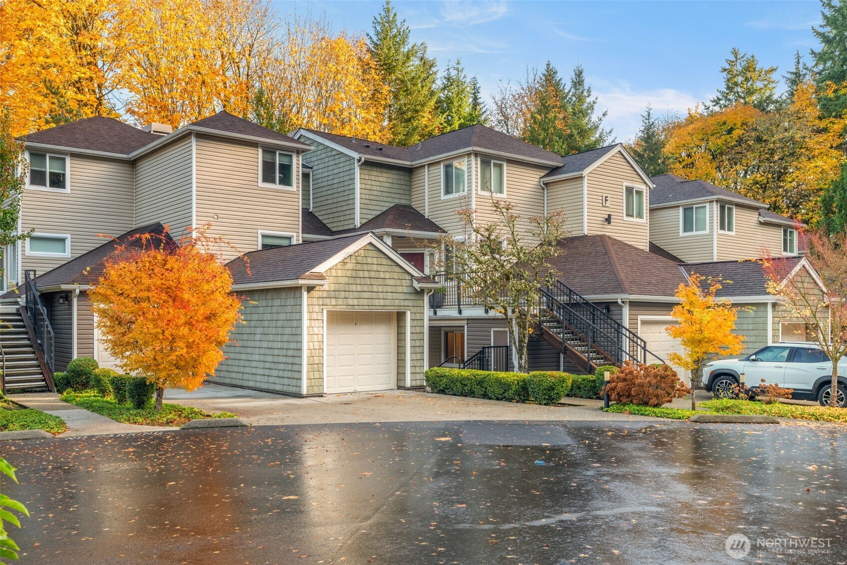 Welcome to Montreux! Nestled against a lush greenbelt on the northern slopes of Cougar Mountain, this peaceful ground-level condo offers the perfect blend of nature & convenience. Enjoy miles of hiking trails, nearby Cougar Mountain Regional Wildland Park, Lake Sammamish, and Mountains to Sound Greenway. Inside, you'll discover new flooring, updated kitchen with new cabinets/countertops, dining area, spacious bedroom, cozy wood-burning fireplace, and peek-a-boo lake view. Don't miss the covered patio, extra storage room, and covered parking. NO RENTAL CAP, ideal for investors or homeowners alike! Highly rated Issaquah schools, pet-friendly community, well-managed HOA, and easy freeway access with a short commute to Bellevue or Seattle.