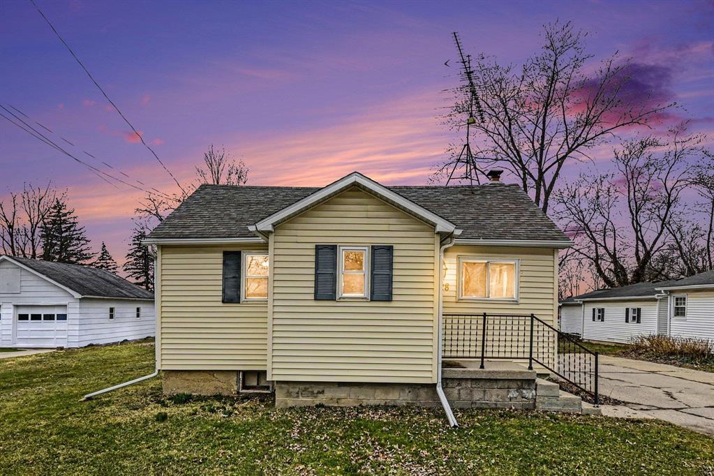 Affordable, flexible, and full of opportunity in the heart of Fowler! This 2-3 bedroom home offers over 1,000 sq ft with a layout designed to adapt to your needs. Currently set up with main-floor laundry for added convenience, the space can easily be converted back into a third bedroom if desired. Enjoy small-town living with big-time convenience-city water/sewer, natural gas heat, a paved driveway, and a 1-car attached garage. One side of the home is equipped with solar panels, offering added energy efficiency and long-term savings potential. The partial basement provides extra storage, and the manageable lot keeps maintenance simple. Whether you're a first-time buyer, looking to downsize, or searching for a smart investment, this home delivers value, versatility, and location-all at an approachable price point. Opportunities like this in Fowler dont last-