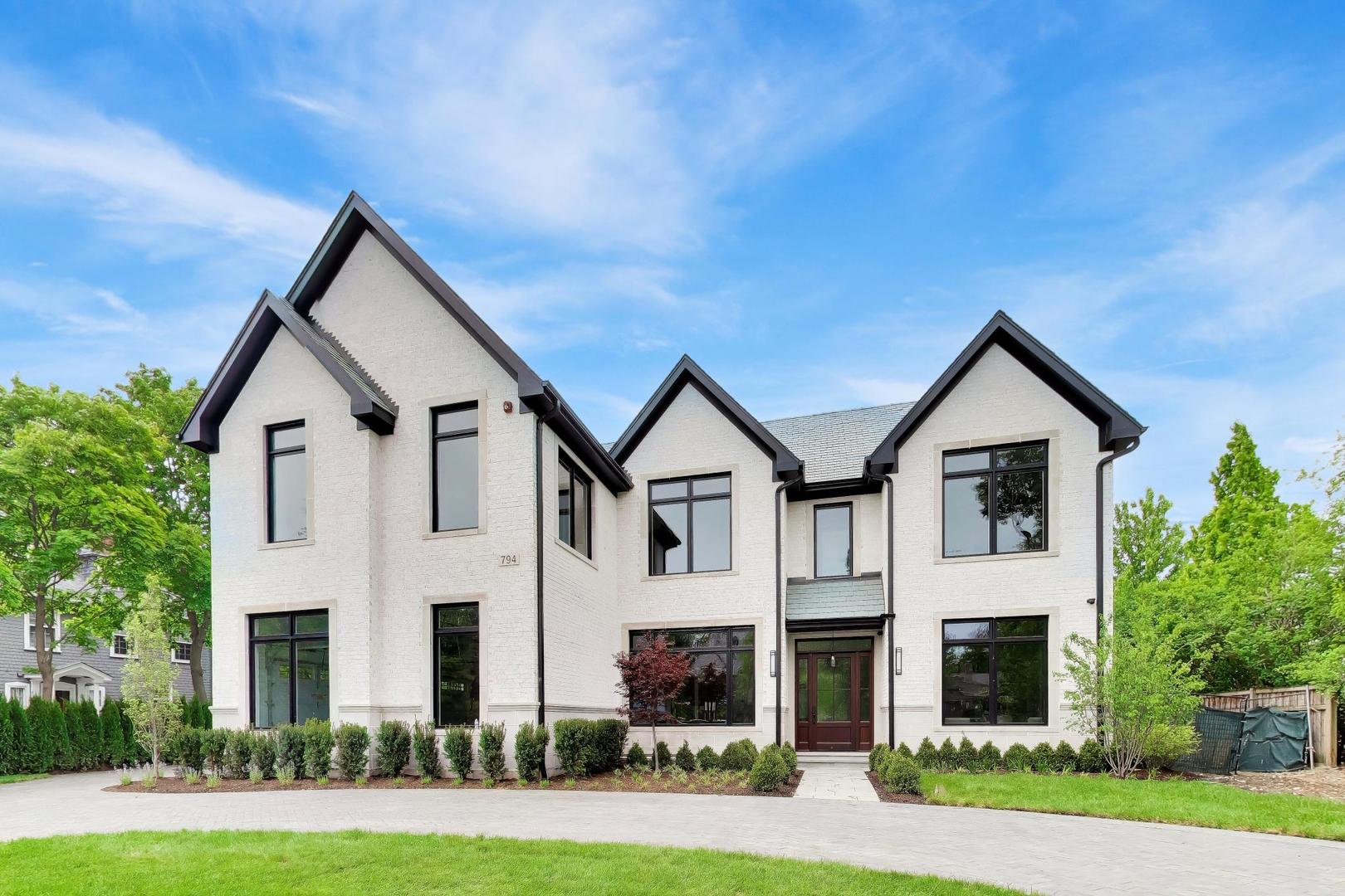 New magnificent transitional home with approximately 9,000 square feet finished space. Exterior is constructed of brick and limestone with slate roof which represents timeless construction on one of the most picturesque streets in Glencoe. Close to town, beach, schools and train the house features 6 bedrooms, 7.1 bath, 3 fireplaces, spectacular Neff kitchen with top-of-the-line appliances including Sub-Zero refrigerators/freezers, luxury Wolf range, espresso/cappuccino machine, drawer style microwave, and much more, walnut library has a built-in desk and filing cabinets. Also included is three stop elevator.Spectacular finished lower level includes entertainment room with fireplace and TV, refrigerated wine cellar, full size wet bar, media room with 4K technology, surround sound and leather reclining chairs.  Sport Court. Outdoor pool with Jacuzzi located in spacious, grassy backyard.The house also offers security system, back-up generator. home is prewired for Smart home system. This house has it all! AGENT OWNED