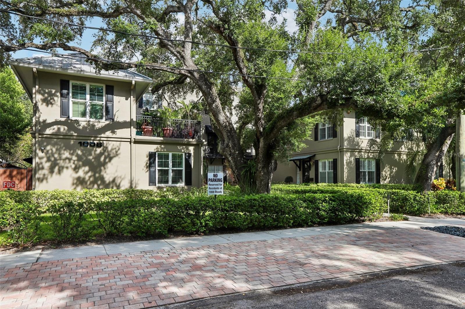A southern charmer! This 3-story townhouse, built in 2007, has 3BR/3.5BA nestled under oaks in Suburb Beautiful on the edge of Historic Hyde Park. It is part of a small community of only 6 units. The architectural style draws on Charleston and Savannah with a quaint central courtyard featuring gas lanterns and a tranquil fountain water feature. The roof was just replaced in 2026 and the HVAC in 2025. The tankless water heater, garage door opener and tracks, and washer/dryer are from 2021. The refrigerator was replaced in 2023. This townhome was originally built with framing for a future elevator, if desired. On the ground floor, there is a bedroom and full bathroom, a wide central hall, and access to the attached two-car garage. This townhome offers plenty of storage. The main living level on the 2nd floor is open to the kitchen and a half bath, with access to a private balcony. The other two bedrooms are on the 3rd floor, each with an en suite bathroom. LOW HOA fees at $275 a month with no assessments. The property is located in Flood Zone X, so flood insurance is optional. Retail and great food are quickly accessible. Hyde Park Village, the South Howard corridor, Bern's Steak House, the Epicurean Hotel, and Bayshore Boulevard all form part of the surrounding community. Mitchell, Coleman, Plant School District. Please schedule a private tour.10018 S Moody Ave #3 is a Southern charmer under the oaks. 3/3.5/2 with 2,527 sq. ft. Three stories, built with an elevator in mind in 2007. Roof 2026. HVAC 2025. Low $275 HOA, Flood Zone X. Southern charmer under the oaks-  3/3.5/2 car garage w/ 2,527 sq. ft.