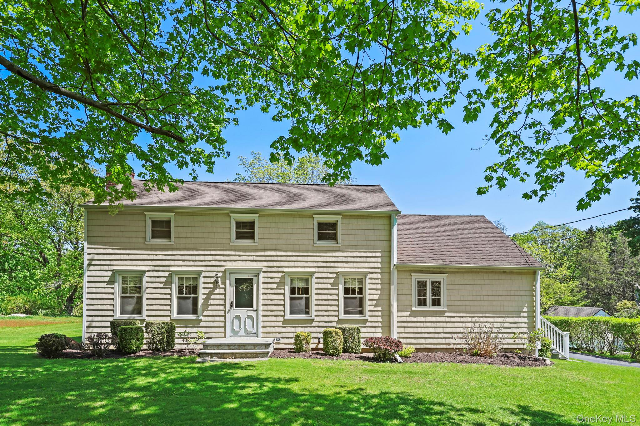 Welcome to your own private sanctuary—a meticulously maintained and thoughtfully updated home. Featuring a 1,620-square-foot retreat where nature meets elegance at every turn. Built in 1946 and lovingly cared for, this exceptional South Salem property offers the rare combination of tranquil seclusion and premier location in the sought-after Katonah-Lewisboro school district.A fabulous setting awaits as you step outside to discover the professional landscaping, quiet, private deck, and mature specimen planting.The expansive deck is perfect for morning coffee, afternoon tea, or evening entertaining. A paved driveway with Belgian block edging and a detached one-car garage complete the welcoming arrival experience. Every season reveals new beauty in this thoughtfully designed landscape.Exceptional Interior Living… Enjoy the updated eat-in kitchen with granite countertops, custom cabinets, and a coffee bar.  Full first-floor bathroom, first-floor den/bedroom, dining room, plus a lovely living room with sliders to the deck and a fireplace for a cozy evening inside. Featuring 3 bedrooms, 2 full baths plus a lower level. Hardwood floors throughout. Nice natural light.The Perfect Location… Enjoy the best of both worlds: a peaceful, private setting in top-rated Katonah-Lewisboro schools, minutes from restaurants, shopping, and Metro-North train service. Whether it's winter snow, spring blooms, summer entertaining, or fall foliage—this home shines in every season.This exceptional property is fully prepared for its next chapter. With every detail attended to and the home in pristine, move-in condition, all that’s missing is your personal touch. Simply arrive, unpack, and start living the lifestyle you’ve been looking for.