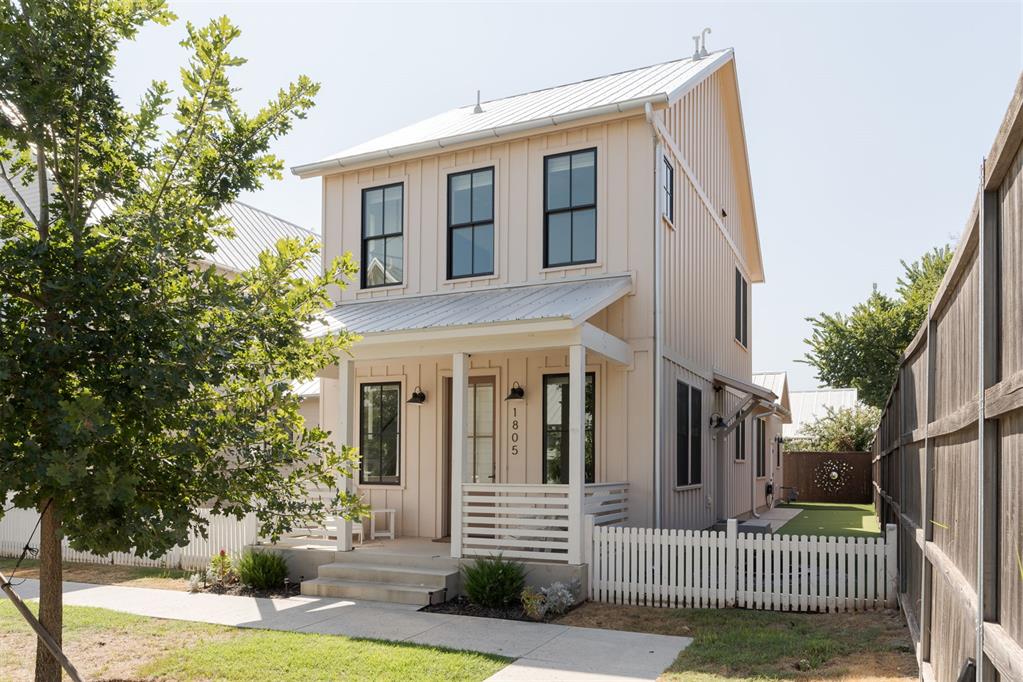Offering all the efficiencies of a traditional Wheeler cottage, this plan includes a few extra perks, like an expansive front porch, attached garage, and an incredibly landscaped, cozy courtyard. The first floor features a rare primary suite along with the open living area, kitchen, and powder bath. Upstairs, two additional bedrooms each include a private study nook and spacious closet. Exclusive to this cottage location, enjoy front-porch views of the adjacent green space and it is just steps from the neighborhood pool, acre park, and playground.