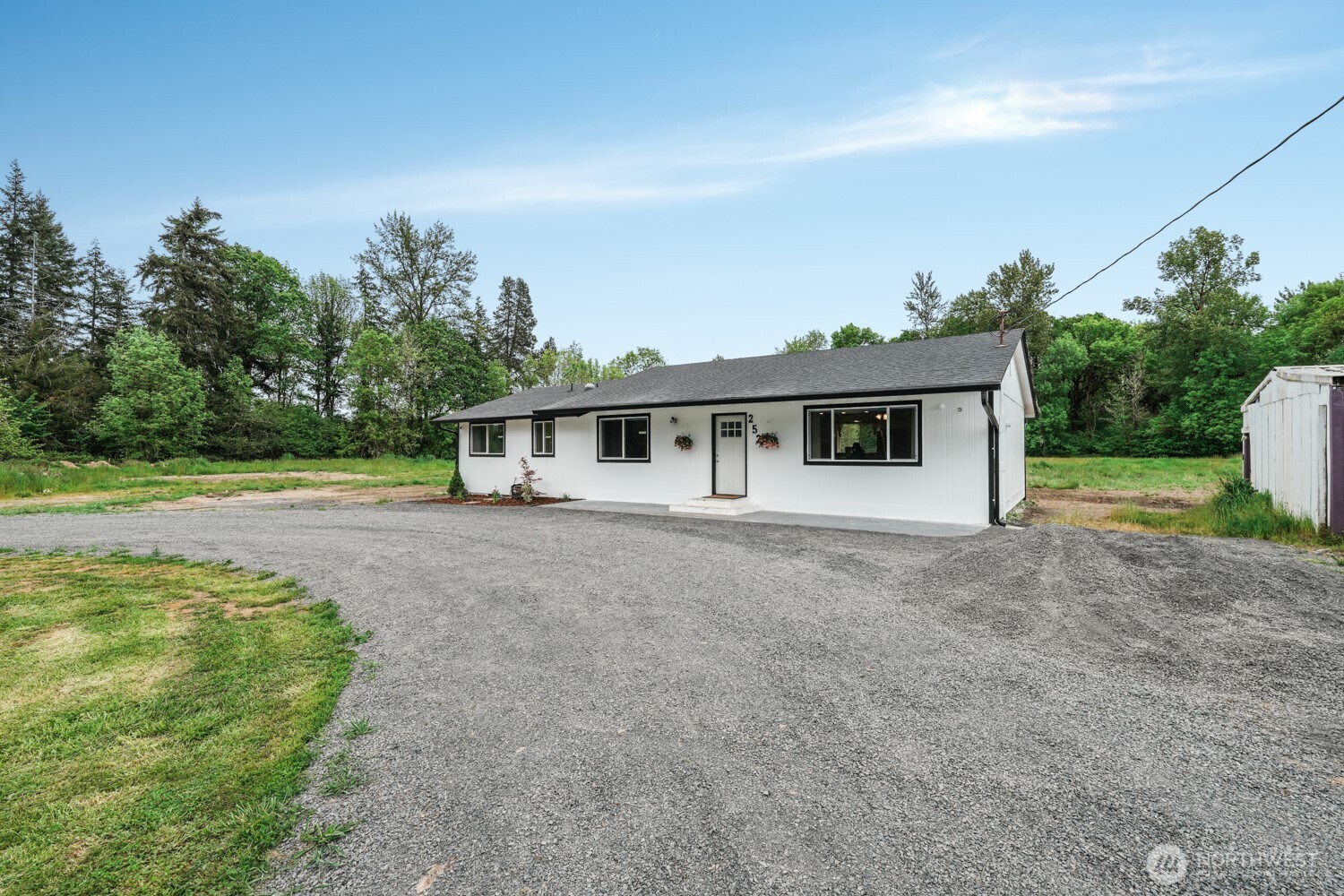 Set on 5 peaceful acres with a circular driveway, this beautifully remodeled 3-bedroom, 1.5-bath home offers the perfect blend of modern comfort & rural charm. Inside, you’ll find an open-concept layout w/ updated finishes throughout, including new LVP flooring, fresh interior paint, recessed lighting, & a cozy wood stove capable of heating much of the home. The fully updated kitchen features a large island w/ butcher block-style countertops, white cabinetry w/ black hardware, modern sink, & SS appliances. The spacious main bath includes dual vanities, updated fixtures, & storage, while the half bath is conveniently located off the mudroom entrance & includes a utility sink, ideal after outdoor projects, pets, or gardening. Extensive upgrades include all new windows, updated plumbing, new water filtration system, newer septic system, new well equipment, & Toledo Tel fiber internet with speeds up to 1 Gbps, making work-from-home easy & reliable. Outside, enjoy flat, usable acreage w/ plenty of room for animals, hobbies, gardens, or simply soaking in the peaceful surroundings. Wildlife including deer and elk are frequent visitors, & apple & pear trees add to the property’s appeal. Conveniently located just minutes to I-5 access, some of the region’s best fishing, & centrally positioned between Seattle & Portland, with easy drives to the Pacific beaches & White Pass skiing. This property offers the space, privacy, & flexibility to enjoy the best of Pacific Northwest living.
