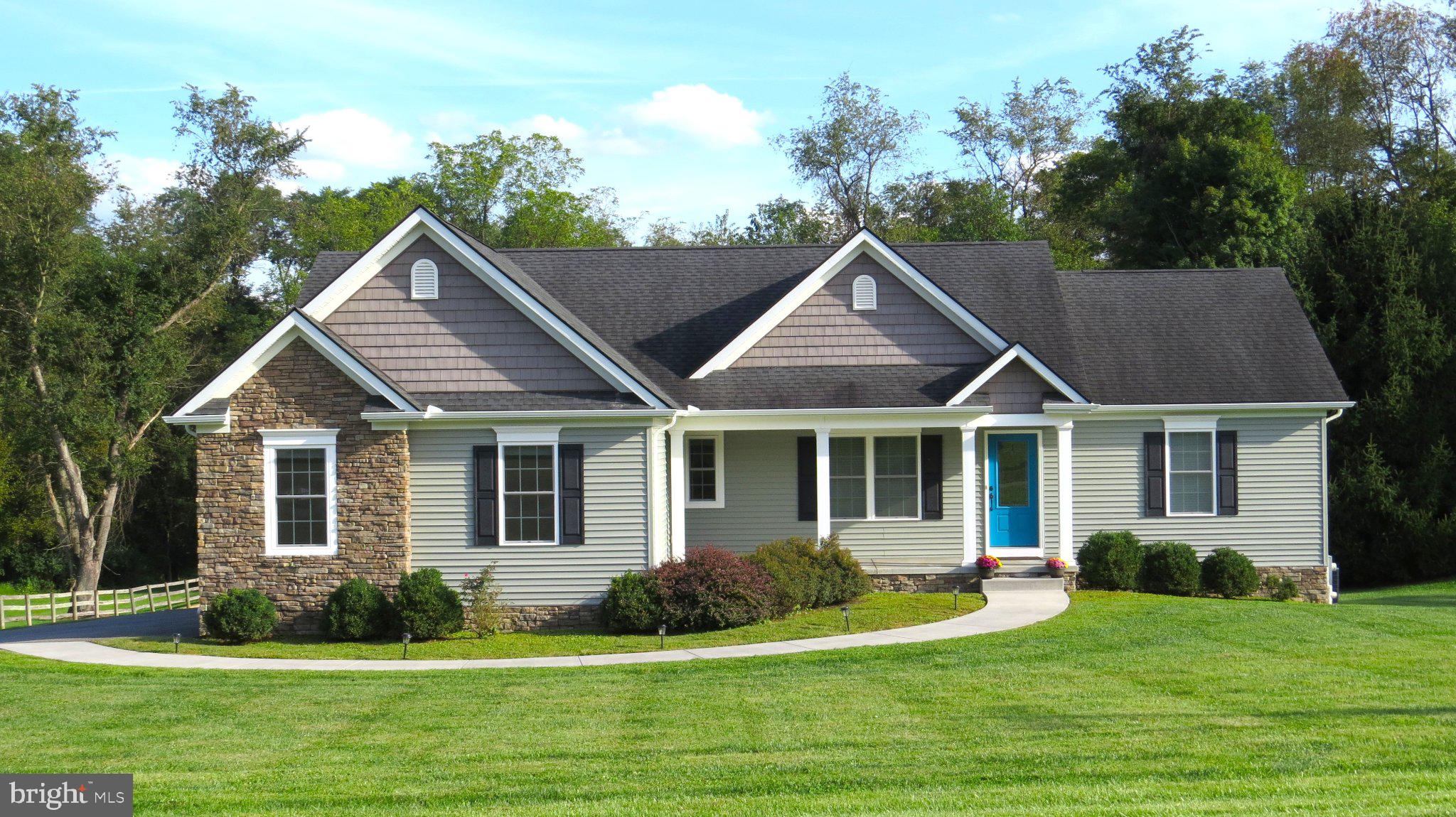 Welcome to 1727 E Mayberry Road in Westminster, MD! Situated on 1.08 acres, this attractive 3-bedroom, 2-full-bath rancher offers comfortable one-level living with plenty of additional space and potential. The kitchen features granite countertops and stainless steel appliances and flows into the spacious family room and dining area, making the layout ideal for everyday living and entertaining. Engineered hardwood flooring runs through the main living areas, with carpet in the bedrooms and tile flooring in the bathrooms.  Enjoy the convenience of first-floor laundry and a thoughtfully designed floor plan. The full unfinished walkout basement provides excellent storage and plenty of possibilities for future finished living space, plus a rough-in for an additional bathroom. Set on a generous 1.08-acre lot, this home offers the space you've been looking for while still being convenient to Westminster and surrounding areas.