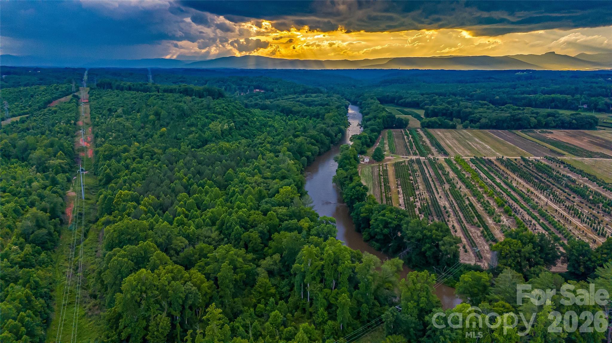 Attention Developers, take a look at this hard to find approx 77 acres of rolling topography within minutes of downtown Morganton or Glen Alpine or Beautiful Lake James. This property offers approx 1280' of paved road frontage on Hwy 70 and approx 2100' of river frontage with amazing long range views of Table Rock and Shortoff mountains. This could be your own private estate or multi housing community. Tons of possibilities! Call today for a private showing. Buyer agents welcome.
