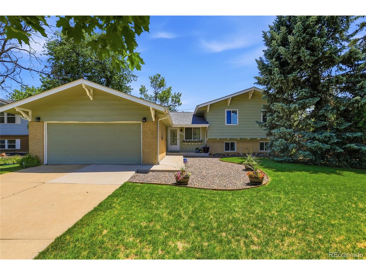 Move-in ready and beautifully updated, this meticulously maintained home offers extensive remodeling, modern comfort, and long-term peace of mind! Completely remodeled and thoughtfully upgraded, this exceptional home combines timeless character with modern functionality inside and out. Pride of ownership shines throughout with extensive renovations, major system updates and quality finishes that make this property truly move-in ready. The heart of the home is the stunning kitchen, thoughtfully redesigned to create a warm and inviting space where everyone naturally gathers. By opening the wall between the kitchen and dining room, the home now flows beautifully for everyday living, entertaining and creating lasting memories. All bathrooms have been extensively remodeled with updated plumbing, modern vanities, upgraded fixtures, tile flooring, improved and stylish finishes throughout. The spacious primary bath includes a custom glass shower, granite countertops, and updated lighting. All improvements provide peace of mind, including a new roof installed in 2024, newer furnace, newer water heater, upgraded electrical panel installed in 2018. Every window and exterior door in the home was replaced in 2013, improving energy efficiency. Step outside into your own private garden retreat, where mature landscaping create a peaceful and relaxing outdoor oasis. Stunning purple clematis vines gracefully climb the covered patio, surrounded by colorful lilies and seasonal flowers that bring beauty and tranquility to every view. The covered patio offers the perfect setting for morning coffee, evening conversations, or simply unwinding while enjoying the serene surroundings. Thoughtfully designed landscaping, flowering gardens, and inviting outdoor spaces combine to create a truly calming backyard escape that feels like a private retreat right at home. Backs to Highline Canal and Aurora Hills Golf Course. Less than 2 miles from Anschutz Medical Center.Don't miss this one!
