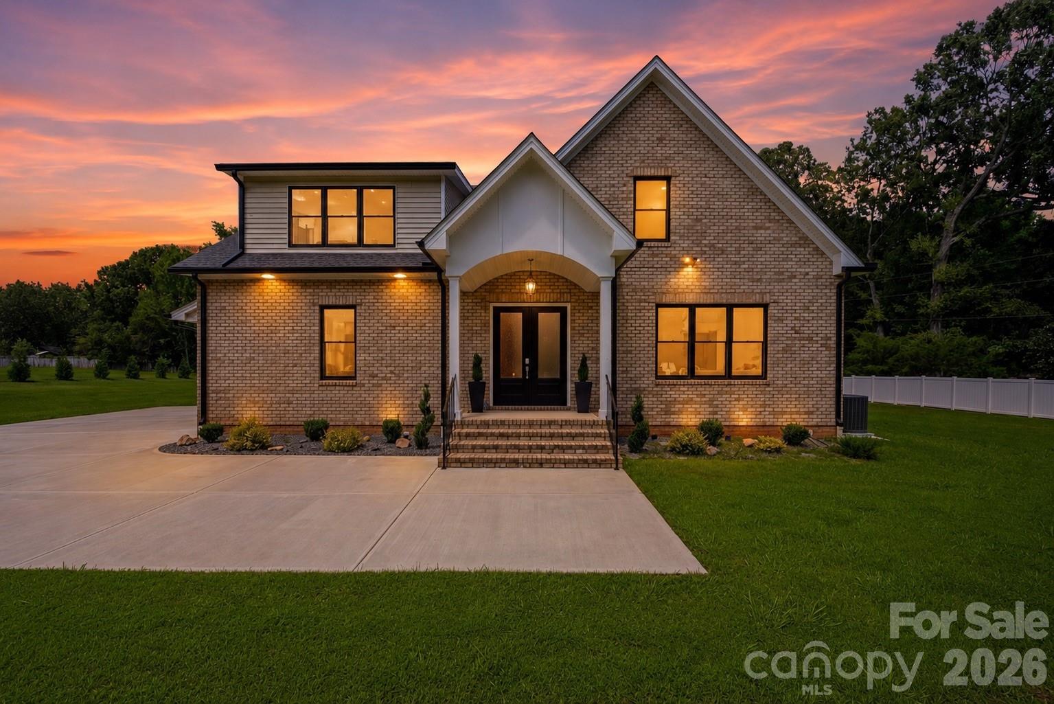 Welcome to the Village of Wesley Chapel. This is a truly custom built home - located on 1.33 private acres with no HOA and zoned for Weddington schools.  Every detail was hand-picked by the actual builder and built with the highest craftsmanship and attention to every detail.  From the materials behind the walls to the finishes you see in every living space. Start above the garage, where a separate full suite with its own private exterior entrance gives you a second living space, ready to work as a guest suite, a luxury office suite, a gym, or a media room. This separate suite adds an additional 484 square feet of living area to the home and it can easily be connected to the main upstairs living area if you wish!  Inside you get two solid oak staircases, 8 foot interior doors at 1 3/4 inches thick, all wood cabinetry, quartz counters throughout, Italian and Spanish tile, and an Italian Verona range. Out back the covered porch looks over a yard set up for a pool, with room to build out the outdoor living around it. What you cannot see matters just as much: Andersen 400 Series windows, copper flashing, 5/8 inch fire rated drywall, a spray foam attic, an encapsulated crawl space, and whole house water filtration and softening. It's all here, and it's ready for you.
