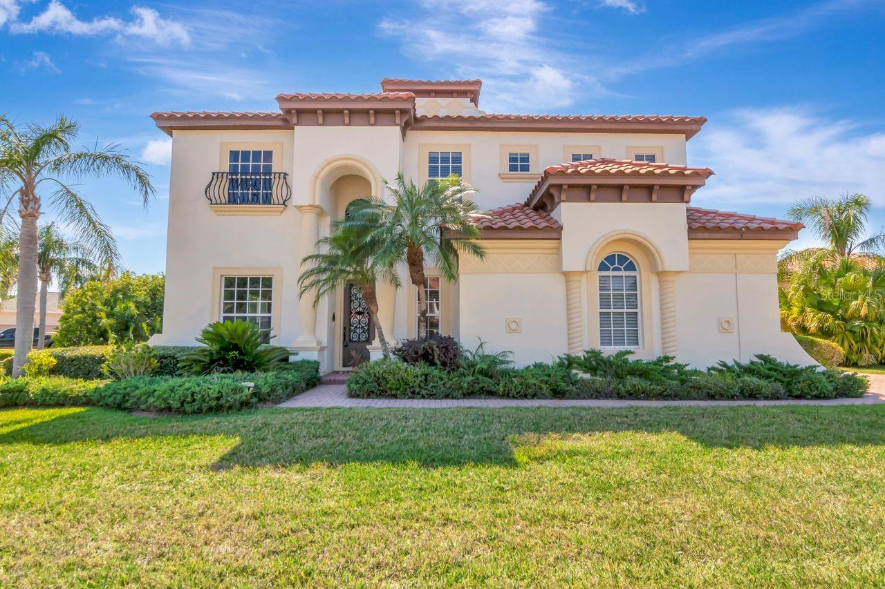 Experience refined living in this fully renovated, custom-designed Tuscan-style residence in the exclusive, guard-gated Cory Lake Isles. Offering 5 bedrooms, 3 full and 2 half baths, this home blends timeless elegance with modern functionality.

Tastefully upgraded throughout, the kitchen, bathrooms, and main living areas showcase thoughtful finishes and elevated design. The chef’s kitchen features rich maple cabinetry, high-end appliances, and designer flooring that flows throughout. The luxurious first-floor primary suite serves as a tranquil retreat, thoughtfully appointed for both comfort and style.

Pocket sliders open to an inviting outdoor oasis—complete with a private pool, outdoor kitchen, and dedicated pool bath—perfect for effortless entertaining. Upstairs, you'll find 5 bedrooms, 2 full baths, and a generous bonus room ideal for a media room, home office, or playroom.

Custom California Closets and carefully curated upgrades highlight the home’s exceptional craftsmanship. Enjoy resort-style amenities including access to the Beach Club, ski lake, community pool, tennis courts, and more.