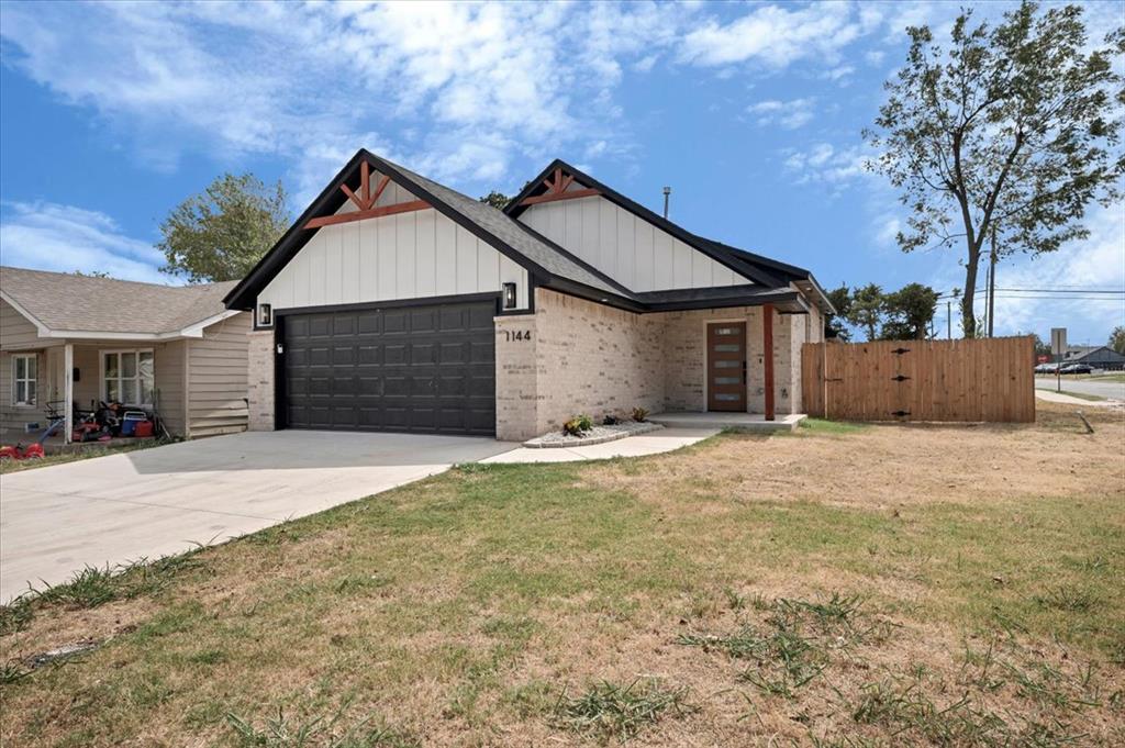 Stunning modern farmhouse in a rapidly growing, up-and-coming area just off Britton and Western. This new home offers an inviting open-concept living and kitchen space with beautiful tile work that elevates the entire design. A built-in mudroom area at the entrance adds both charm and everyday convenience.The primary suite feels like a retreat, featuring double vanities, a gorgeous stand-alone tile shower, a relaxing soaking tub, and a walk-in closet designed for two. Thoughtful finishes and a bright, modern aesthetic make this home stand out. Located minutes from the newly revitalized downtown Britton district, this area continues to grow with new shops, dining, and development—an ideal spot for buyers seeking style, comfort, and long-term value.