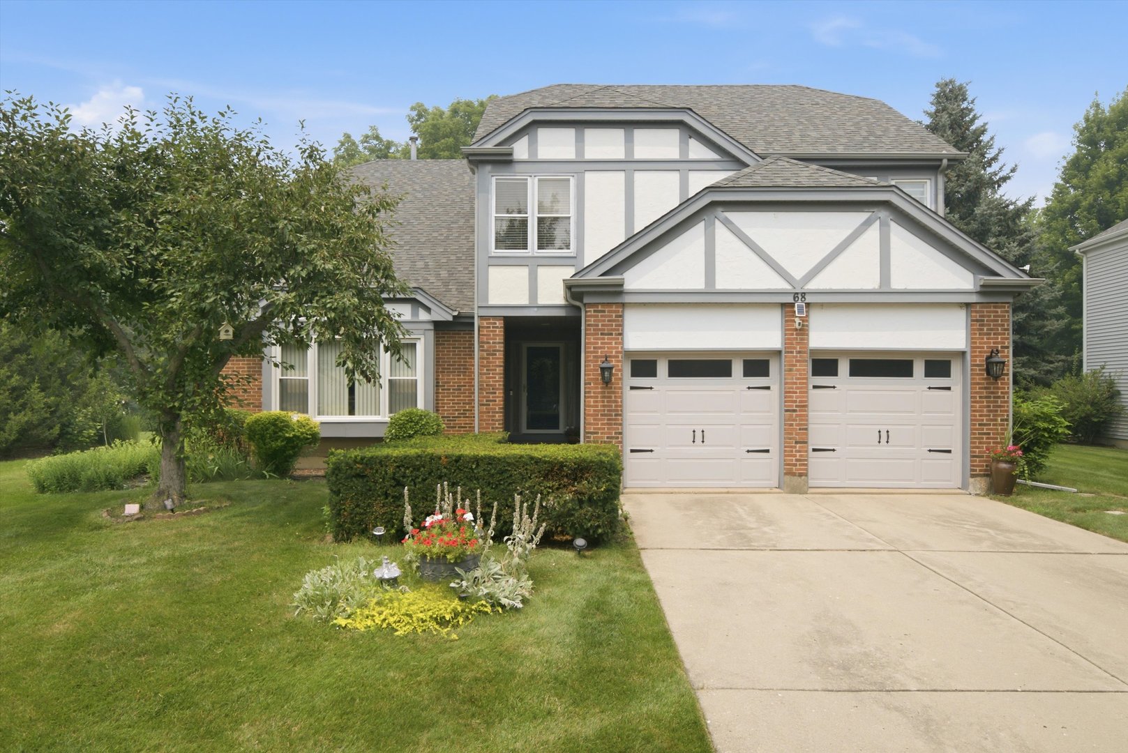 Rare opportunity to own a beautifully maintained 5-bedroom, 2.5-bath home nestled in the highly sought-after Fiore subdivision of Buffalo Grove and located within the award-winning Stevenson High School District. Situated on a premium golf course lot, this exceptional property offers breathtaking views, unmatched privacy, and a backyard setting that's truly one of a kind. The thoughtfully designed floor plan includes a desirable main-level bedroom, perfect for guests or a home office. Step inside to bright and inviting living spaces featuring fresh interior paint and generous room sizes designed for both everyday living and entertaining. The finished basement complete with new carpet provides valuable additional living space ideal for a recreation room, home office, gym, or playroom. Enjoy seamless indoor-outdoor living on the expansive deck, accessible from multiple points throughout the home, creating the perfect space for entertaining or simply relaxing while taking in the stunning golf course views. Upstairs the spacious primary suite features a private balcony overlooking the golf course, the perfect place to enjoy your morning coffee or unwind at the end of the day. Smart home features including an August smart lock and Nest thermostat add everyday convenience, while the professionally installed irrigation system keeps the lawn lush with minimal maintenance. Recent improvements include roof & siding (2017), most of the windows replaced (2021), sprinkler system (2021), paint (2023), deck (2023).  An attached two-car garage completes the property. Metra train station within walking distance and the school bus stop outside the house.  This move-in-ready residence offers the perfect combination of a premium golf course setting, functional living space, modern conveniences, exceptional schools, and an unbeatable location!!