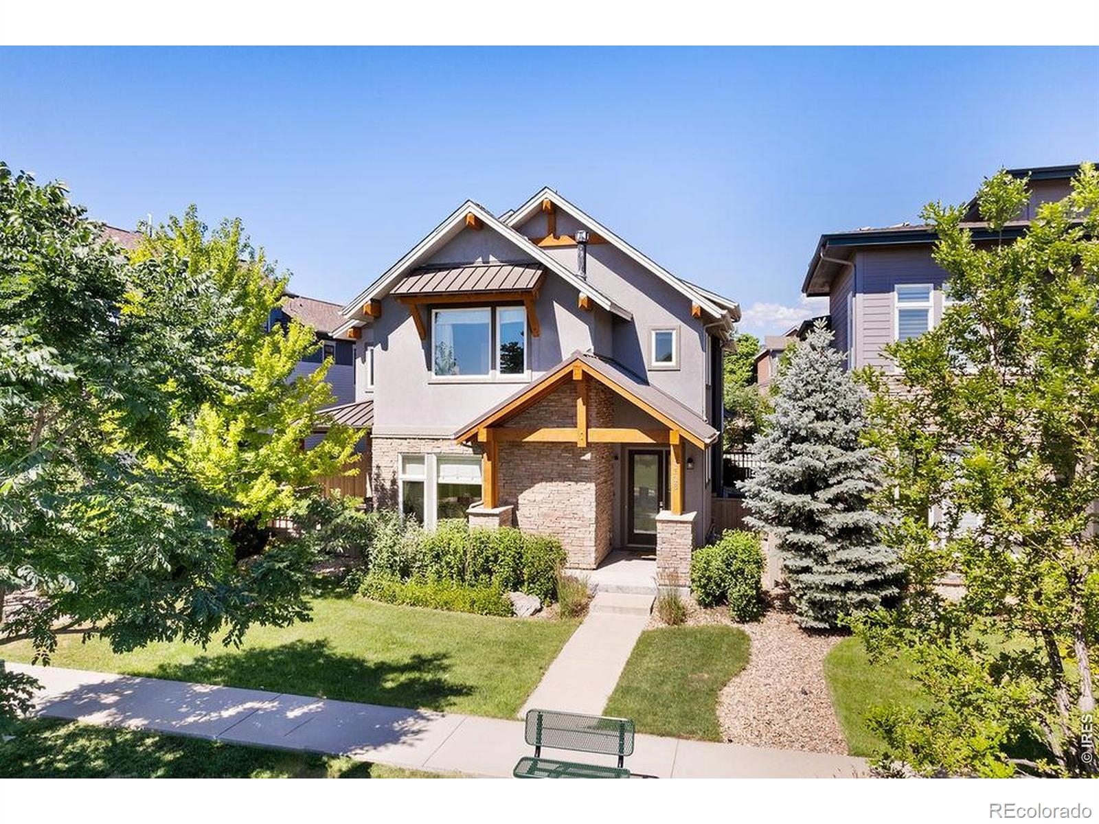 Step into this modern and serene five bedroom home featuring gorgeous natural light, open concept living and a stunning roof deck with mountain views. With over 5,000 sqft of living space, a double office, outdoor dining, and finished basement this home is perfect for entertaining or tranquil indoor and outdoor living. The main level open floor plan seamlessly connects the living, dining, outdoor patio and kitchen areas, creating an inviting space for gatherings. The gourmet kitchen is a chef's dream, featuring high-end appliances, double islands and an oversized pantry. Ascend to the upper levels to discover the primary suite, complete with a spa-like en-suite bathroom and expansive, custom walk-in closet. This floor also features a guest suite with full bath, the laundry room and two additional large bedrooms with a full guest bath. On the top floor, a cozy media room and wet bar lead through gorgeous glass doors to the outdoor roof deck and breathtaking mountain views. The home also features a fully finished basement with a 5th bedroom, work/gym area and large storage room. Facing a neighborhood green space, this home provides access to the outdoors with zero maintenance. Offered with all high-end furniture at additional price, this home can truly be the epitome of move-in-ready. Let's get you home to Clifton Ct. Showings Start Saturday June 20th.