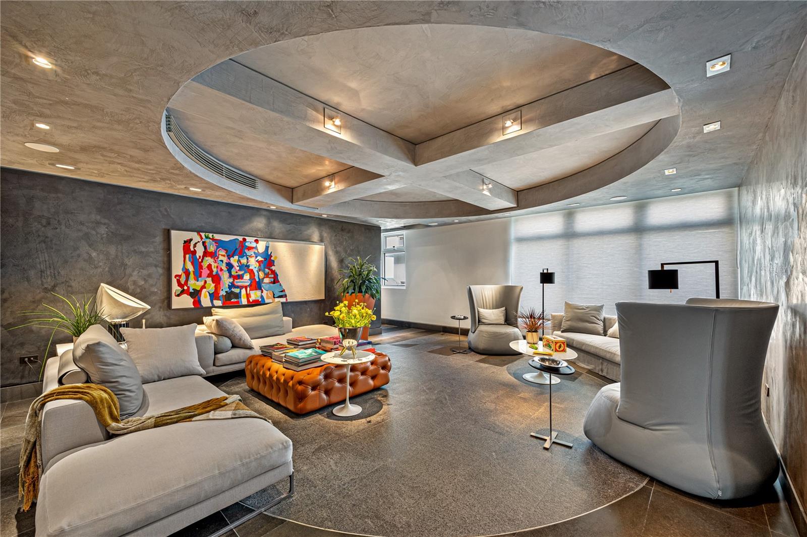 Stunning turnkey penthouse spanning approximately 5,908 square feet across three levels, thoughtfully redesigned to offer a sophisticated, New York-inspired living experience just one block from Ocean Park.This residence was completely transformed under the vision of designer José Camacho, showcasing a curated modern aesthetic with unique architectural details, custom ceilings, and high-end finishes throughout.The layout is intelligently distributed to maximize both privacy and entertaining. The first level is dedicated to the private quarters, featuring four spacious en-suite bedrooms and a comfortable family room, creating a quiet and functional retreat.The main level serves as the heart of the home, offering expansive living areas including a formal living room, a dining area for ten, and a beautifully designed Boffi kitchen complemented by a casual dining space and an additional family sitting area. This level also includes a powder room and a full service quarters with its own bathroom.The top level is designed for entertaining and lifestyle, featuring a large family room, a secondary kitchen, a bar area, full bathroom, and an expansive terrace that seamlessly extends the living space outdoors—ideal for gatherings or relaxed evenings with open city views.Offered fully furnished and turnkey, this penthouse combines design, scale, and functionality, making it ideal as a primary residence, second home, or investment property.Additional features include two parking spaces, a private storage unit, and a full-power generator that services the entire apartment. The boutique building offers privacy and exclusivity in a prime location walking distance to the beach, St. John’s and Robinson’s schools, restaurants, and the vibrant lifestyle of Condado and Ocean Park.A rare opportunity to own a truly distinctive, design-forward penthouse where every detail has been thoughtfully executed. HOA: $1,522 Property Taxes: $8,663.20 Insurance: $10,477.72 Sq.Ft:5,908