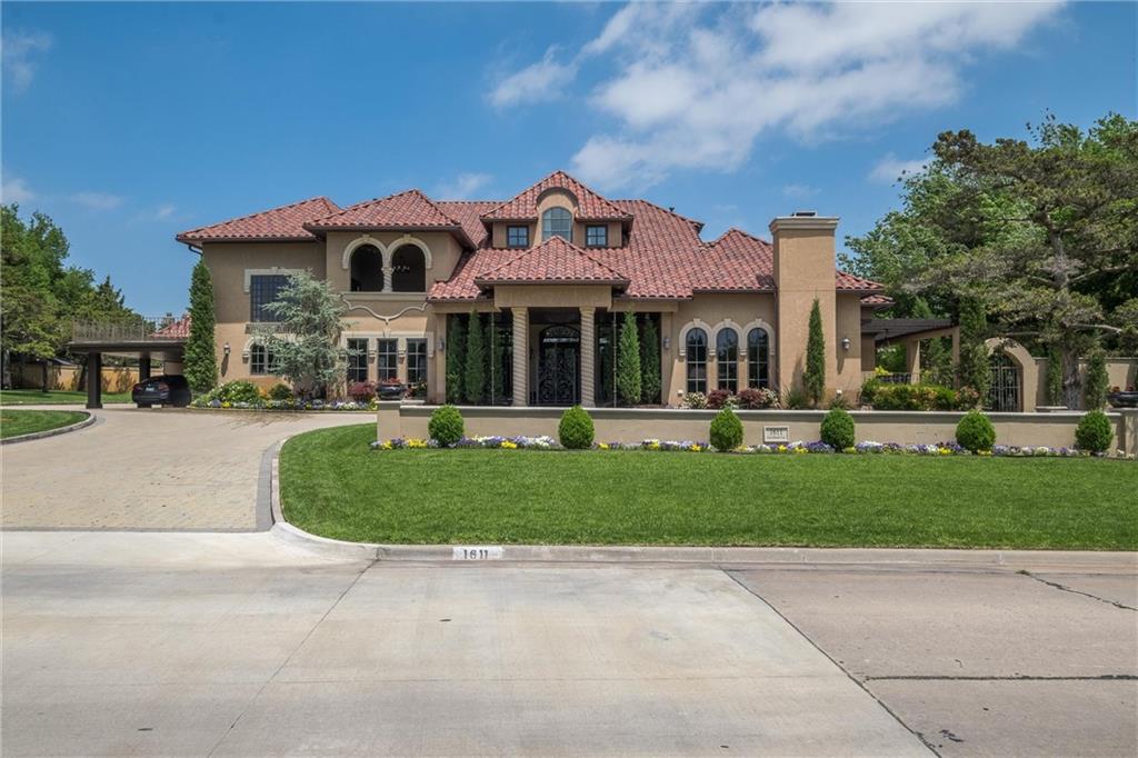 Stunning Mediterranean home located in the heart of Nichols Hills. Completely remodeled to the studs, the downstairs of this home flows perfectly from the kitchen and living/dining room into the game room and media rooms. Wonderful downstairs master suite with large bathroom, private utility room, large closet and attached study. Fabulous outdoor living space with kitchen and tiered backyard with pool. Upstairs there are three bedrooms with ensuite bathrooms and craft room. Four car garage with two additional covered parking spaces.