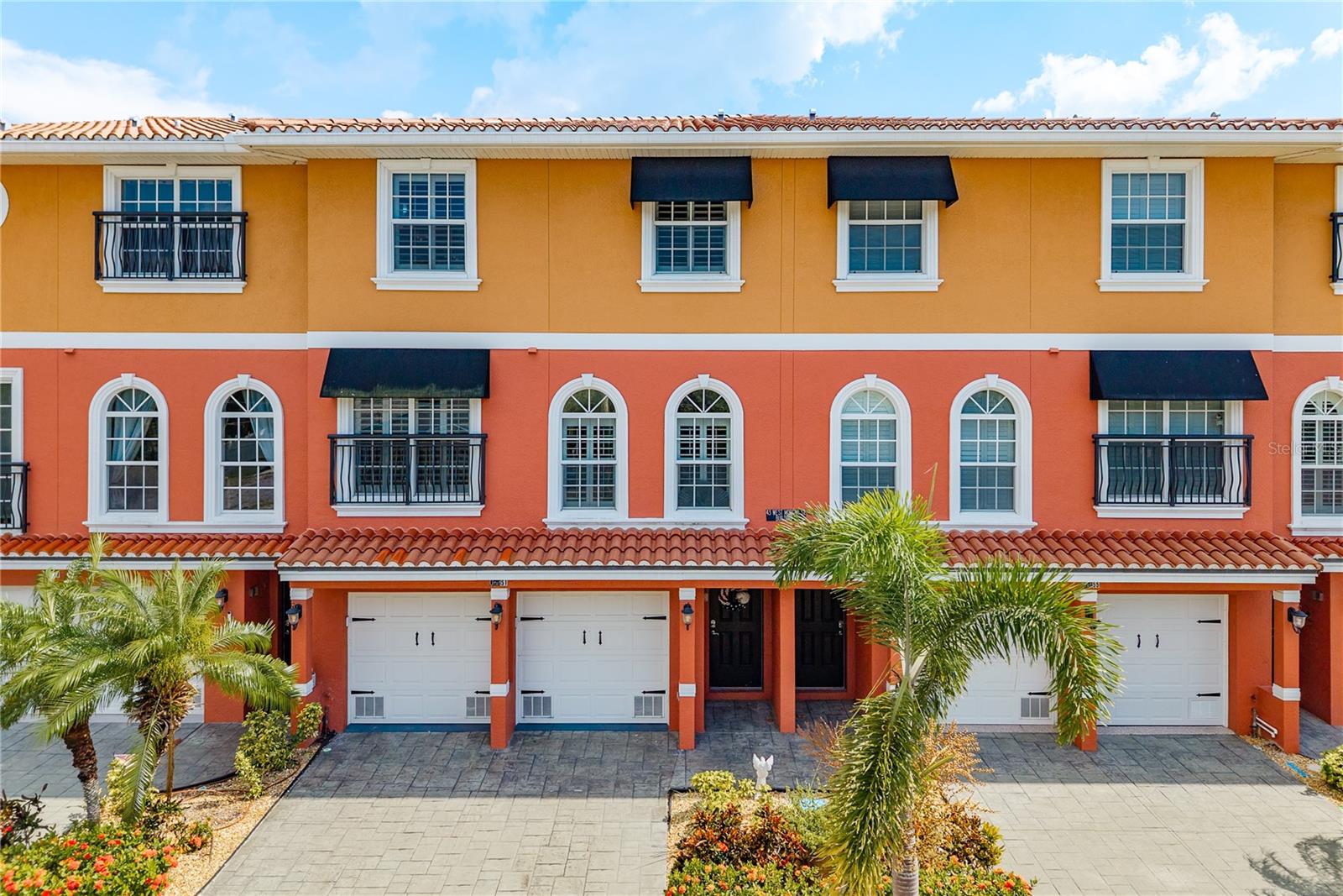 LUXURY Waterfront Living in the Heart of Tarpon Springs!!! Special Offer: Enjoy access to a preferred lender with exclusive great-rate financing, making your dream of Gulf-front luxury even more within reach. (BONUS: TWLIGHT PHOTS AND 3D TOUR COMING SOON!!)
Welcome to this stunning Mediterranean-style waterfront townhome offering the perfect blend of luxury, location, and lifestyle — complete with your own private dock and like-new 6,000 lb boat lift just steps from your back door. Enjoy boating access to the Gulf of Mexico within moments, making it easy to embrace the Florida waterfront lifestyle.
Located in a prime walkable location, you're just minutes from downtown Tarpon Springs, where breweries, bars, restaurants, boutique shops, and the World Sponge Docks await. Plus, the PINELLAS TRAIL is only steps from your front door, inviting you to explore the area by bike or foot with ease.
Built in 2008 with SOLID BLOCK CONSTRUCTION ALL THE WAY TO THE TOP, impact windows, and a beautiful barrel tile roof, this home is as strong as it is stunning. Inside, you'll find over 2,500 square feet of elegantly upgraded living space, featuring:

* Gorgeous MARBLE COUNTERTOPS!
* Custom SOLID WOOD CABINETRY, TALL TRIM, TALL SOLID CORE WOOD DOORS THROUGHOUT!
* A PRIVATE ELEVATOR!
* Dual balconies with tropical, tranquil water views!
* A spacious CUSTOM PAVERED PATIO — perfect for grilling today’s fresh catch and entertaining waterside!
* A **4-car tandem garage** with ADDED ELEVATED STORAGE!
* BEAUTIFUL PLANTATION SHUTTERS and MOTORIZED SHADES that elevate privacy and create the perfect movie-night ambiance!
* Perfectly tinted master bedroom windows on the top floor to reduce glare and enhance comfort without sacrificing views!
* Conveniently located office space, generously sized to double as a guest retreat — even large enough to add a MURPHY BED for the many visitors who will want to be close to all the amazing things Tarpon Springs has to offer!
This rare, ORIGINAL OWNER HOME has been meticulously maintained and is move-in ready for your next chapter of waterfront living. As a bonus, it includes a **13-month Choice Home Warranty ULTIMATE Plan** for complete peace of mind.
And if you're dreaming of a **third bedroom or even a third bath**, just ask! I’ll show you how easy it is to make it happen!
Whether you're a boating enthusiast, foodie, or just love the charm of coastal living, **this is your opportunity to own one of Tarpon Springs' most coveted waterfront townhomes**.

**Schedule your private showing today!**