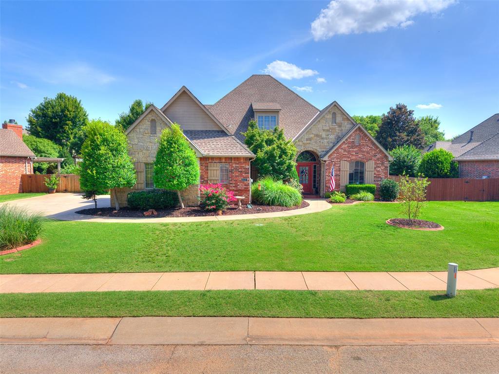 Highly sought-after location in beautiful Coffee Creek! This cherished stone-and-brick home offers an exceptional floor plan with all bedrooms conveniently on the main level, including a private, split primary suite. Enjoy versatile living with three spacious living areas, including a large upstairs bonus room. Perfect for a game room, media space, or playroom. One of the downstairs living areas includes a built-in desk with shelving, making it ideal for a home office, while still offering space for a cozy sitting area. Warm custom wood floors and rich woodwork create an inviting atmosphere throughout. The spacious kitchen features two pantries, a center island, and comes complete with the kitchen refrigerator. The living room impresses with its vaulted ceilings and abundant natural light. The seller will also leave the sound bar, receiver, and bass speaker for your enjoyment. Updates include dishwasher (6 years old), one hvac system replaced, dual hot water tanks (both replaced in last 1-3 years). Large storm shelter for peace of mind and expansive private back patio. This home is conveniently located near schools, retail, restaurants, grocery stores, and the post office. Residents of this section in Coffee Creek enjoy access to two neighborhood pools, playgrounds, recreation rooms, and ponds. Don’t miss your chance to live in this wonderful community.