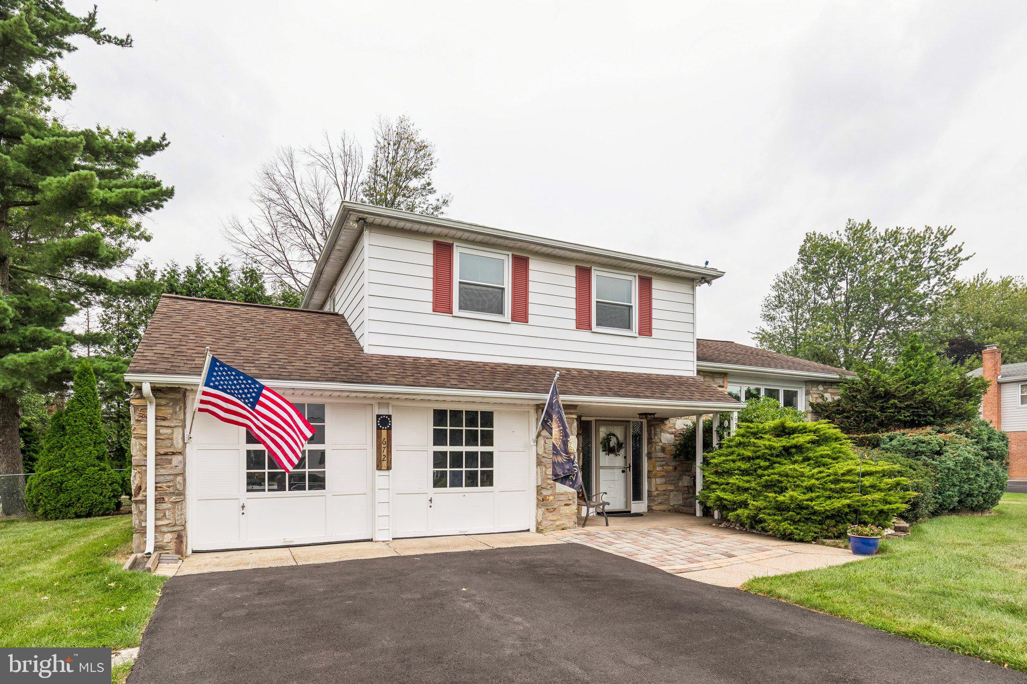 Welcome to this beautifully renovated 3-bedroom, 2.5-bath split-level home in the award-winning Lower Moreland School District, where exceptional indoor and outdoor living come together.The heart of the home is the stunning chef-inspired kitchen, thoughtfully designed with two-tone cabinetry, an expansive center island with breakfast bar seating, a gas cooktop with a convenient pot filler, double wall ovens, abundant workspace, and sliding glass doors that open to your own private backyard retreat. Whether preparing a family meal or entertaining a crowd, this kitchen was designed to impress.Step outside and discover an incredible outdoor oasis. Surrounded by mature trees that provide exceptional privacy, this resort-style backyard features a custom heated 8-foot-deep swimming pool with an integrated spa, multiple decks for lounging and entertaining, a spacious patio, landscaping, and a fully fenced yard. Whether you're hosting unforgettable summer gatherings or enjoying a peaceful evening at home, this backyard truly feels like your own private resort.Inside, you'll find beautifully updated bathrooms, hardwood floors, and a spacious living room featuring a dramatic custom brick accent wall with a working electric fireplace that serves as the centerpiece of the home. A separate family room provides additional space for relaxing or entertaining, while the finished lower level offers endless possibilities as a media room, game room, home office, fitness space, or playroom.Additional highlights include an attached two-car garage with direct interior access to the home, providing everyday convenience and protection from the elements, outdoor storage sheds, and thoughtful updates throughout. Every space has been lovingly maintained, making this home completely move-in ready.Ideally located in one of Huntingdon Valley's most sought-after neighborhoods and within the highly acclaimed Lower Moreland School District, 672 Killdeer Lane offers the perfect blend of style, comfort, privacy, and convenience.This is more than a home. It's a place where memories are made, summer days are celebrated by the pool, and everyday living feels like a getaway. Don't miss this rare opportunity to own one of Huntingdon Valley's most exceptional homes.