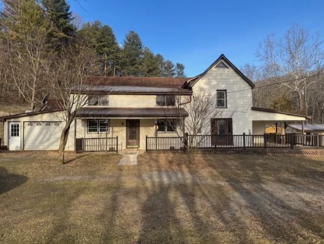 Take the country back roads to the place that feels like home!  What potential can you find in this 3072 sq. ft. home with  possibly 6 bedrooms, loft area, den, 300 sq. ft. front covered porch, 344 sq. ft  wrap around deck,  a nice level yard with mature trees, 5 bay barn/building with several possible uses, guesthouse/area and much more!