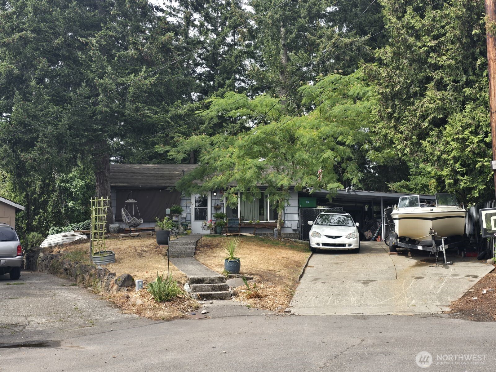 **INVESTORS, BUILDERS & VISIONARIES—OPPORTUNITY KNOCKS IN RENTON!** Unlock the potential of this approximately 8,311 SF lot in an established neighborhood where land, location & future possibilities take center stage. Zoned R-8, this property presents an intriguing opportunity for buyers exploring redevelopment, middle-housing, expansion or a long-term hold strategy. The existing 2-bedroom, 1-bath residence offers approximately 660 SF and is connected to public water & sewer, providing an existing footprint while you evaluate the property's highest & best use. Renton continues to evolve with residential investment, infill development & increasing demand for housing positioned within convenient reach of major Eastside & Seattle employment centers. Whether your vision is to renovate, hold as an investment or investigate future development possibilities, the generous lot creates options rarely found at this price point. Tenant occupied; buyer to verify occupancy, possession, zoning, development feasibility, utilities & all intended uses to buyer's satisfaction. Property sold as-is. Bring your contractor, architect & imagination—the value here may extend well beyond the existing home.