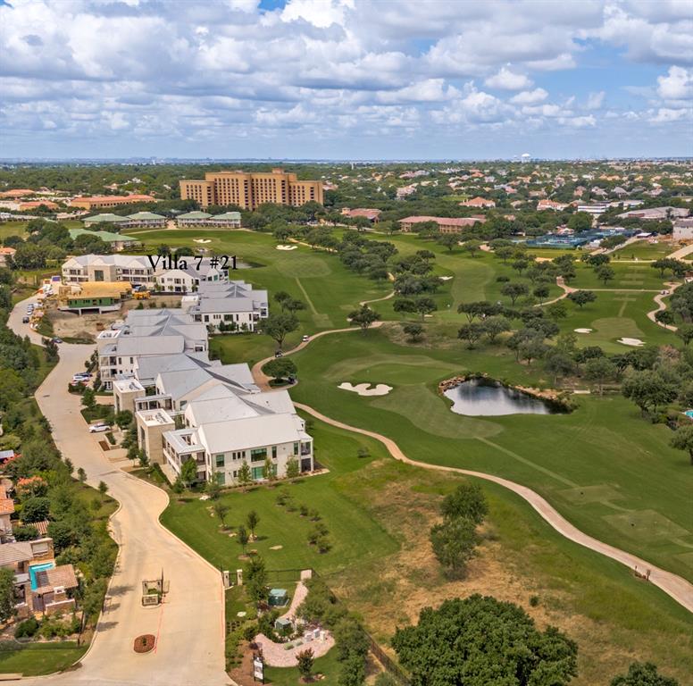 The Residences are luxury new construction golf villas nestled on the 17th and 18th fairway of the prestigious TPC Las Colinas golf course. Adjacent to the Ritz Carlton Resort and the Nelson Golf and Sports Club.  Villa Seven was just completed and #21 is the only new construction available for immediate move-in. This Villa offers spectacular panoramic views of the scenic waterfall! #21 is the premium penthouse corner location! Includes an oversized and enclosed 3-car garage! Relax on your private terrace and enjoy the serene sound of the waterfall while watching the sunset over the Ritz.   These unique, one-story villas are a golfers paradise and an architectural masterpiece. The open-concept design is enhanced by high ceilings and an abundance of natural light provided by floor to ceiling windows.  A blend of classic and contemporary that exude excellence and understated elegance. Offering nature's tranquility, the golf course is designated as a “certified Audubon cooperative sanctuary.” Experience the epitome of resort living within minutes of downtown Dallas. The Residences are a cart ride away to golf, tennis and pickleball courts, dining, pools with cabanas, the spa, social events and all of the amenities offered with the Nelson club and Ritz Carlton resort.  Only a moment to the Las Colinas business hub headquarters and upcoming Wells Fargo campus, Toyota Music Factory and entertainment complex, Lake Carolyn with multiple lakefront dining and retail options. The location is unsurpassed for business or personal travel. Only 10 minutes to DFW and 15 min to Love Field Airports.  Experience resort living and a luxury, low-maintenance lock and leave lifestyle at its' finest!
