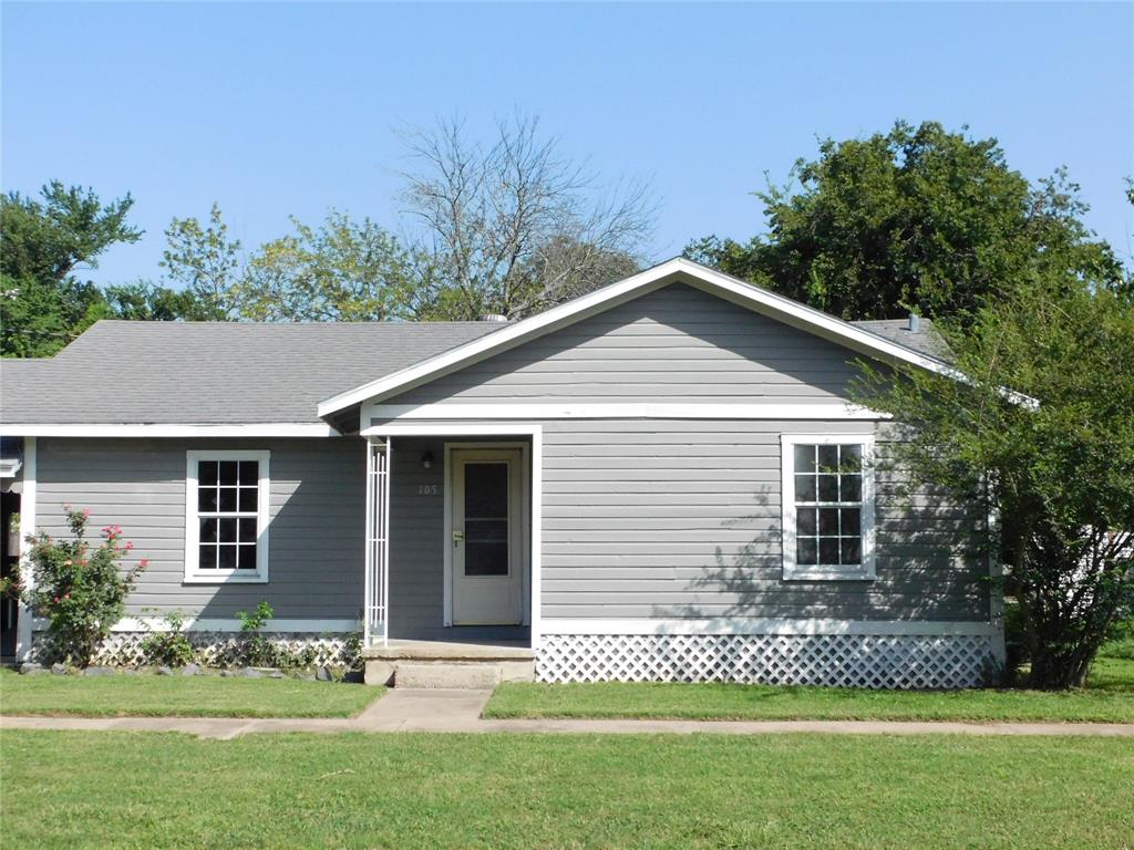 This home boasts a convenient Hubbard location just off Magnolia Avenue.  The 2 bedroom 2 bath home has one of the most spacious primary bedrooms that I have seen in a while.  Over 20 feet will offer plenty space for a king size bed and furniture as well as a reading nook and even a sewing or quilting space with laminate floors.    The joining primary bathroom is another room that has ample space.  The tub and freestanding shower are both a nice addition.  A linen closet plus under sink cabinet storage are just icing on the cake.  The laundry area in this room makes for handy laundry days. The kitchen has granite countertops, built in stove and oven.  The refrigerator stays.  The eat in kitchen offers plenty of space for a family size table and a hutch.  The living area has wood floors and unique wood walls.  The hall bath is a tub shower combo close to the front bedroom that has carpet floors and a ceiling fan.  The back deck is a great place for an outdoor kitchen for grilling and sitting outside.  There is a detached 1 car garage and a nice workshop on concrete.  Across from the side entry door ramp through the breezeway is another storage space with workshop style tables for the hobby person.  All in all, all usable space in this home that has been lovingly cared for.