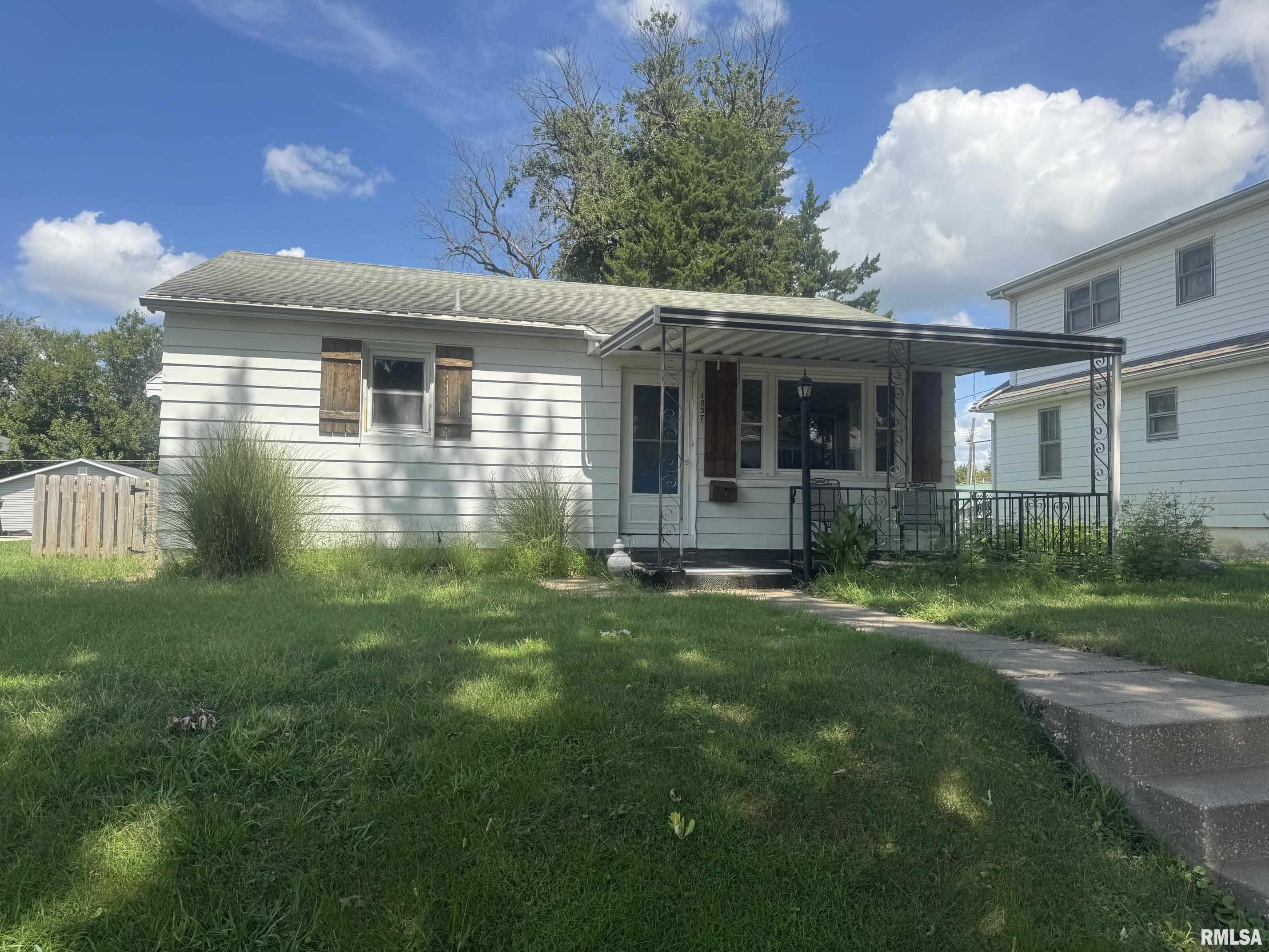 2 bed, 2 bath home with large fenced in yard.  Spacious kitchen. Some windows have been replaced and water heater was replaced in 2018.
