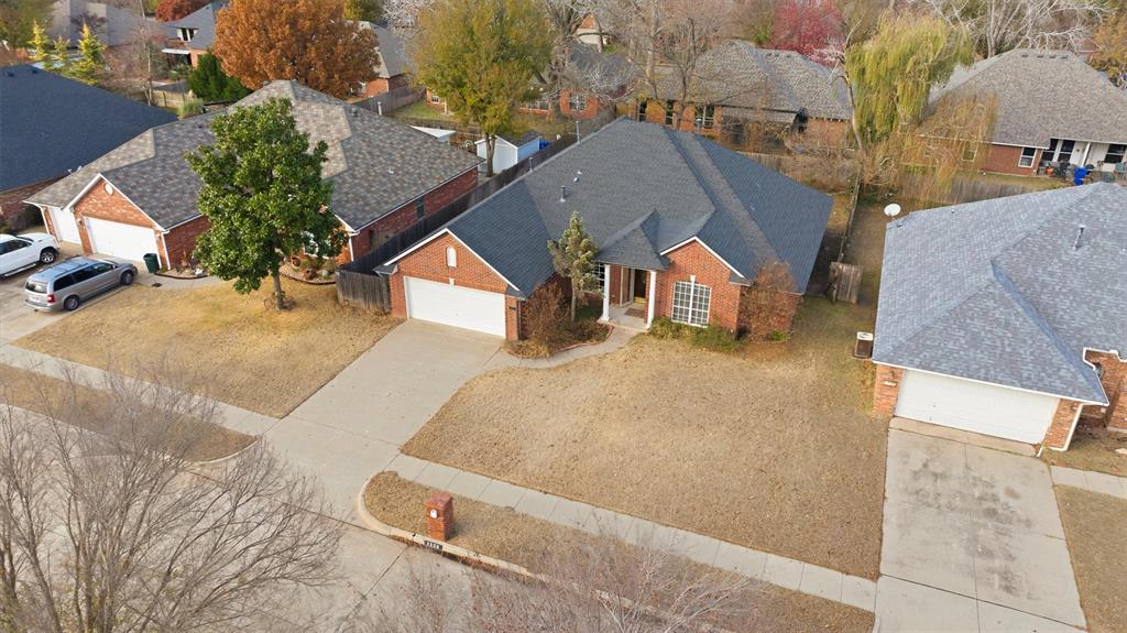Located in the established Cambridge neighborhood of West Norman, this 4-bedroom, 2,614 sq ft home offers size, location, and opportunity for buyers prepared to take on some updates. This property could use significant cosmetic and system updates and is priced accordingly. The flexible floor plan includes two living areas, a dedicated study (included in the bedroom count), multiple dining spaces, and generously sized rooms throughout. The main living room features a gas fireplace with built-ins, while the kitchen offers granite countertops, ample storage, and backyard views, all ready for renovation or re-imagining. A newer roof (2021) and fresh carpet provide a head start and buyers should expect additional work throughout the home. The primary suite includes double vanities, a walk-in closet, separate shower, and jetted tub, with three additional bedrooms offering flexibility for future use after updates. Located minutes from parks, walking trails, shopping, and dining, this Cambridge home represents a rare chance to purchase a larger home under $300K in West Norman for those willing to renovate. Ideal for buyers seeking equity potential in one of Norman’s most established neighborhoods.