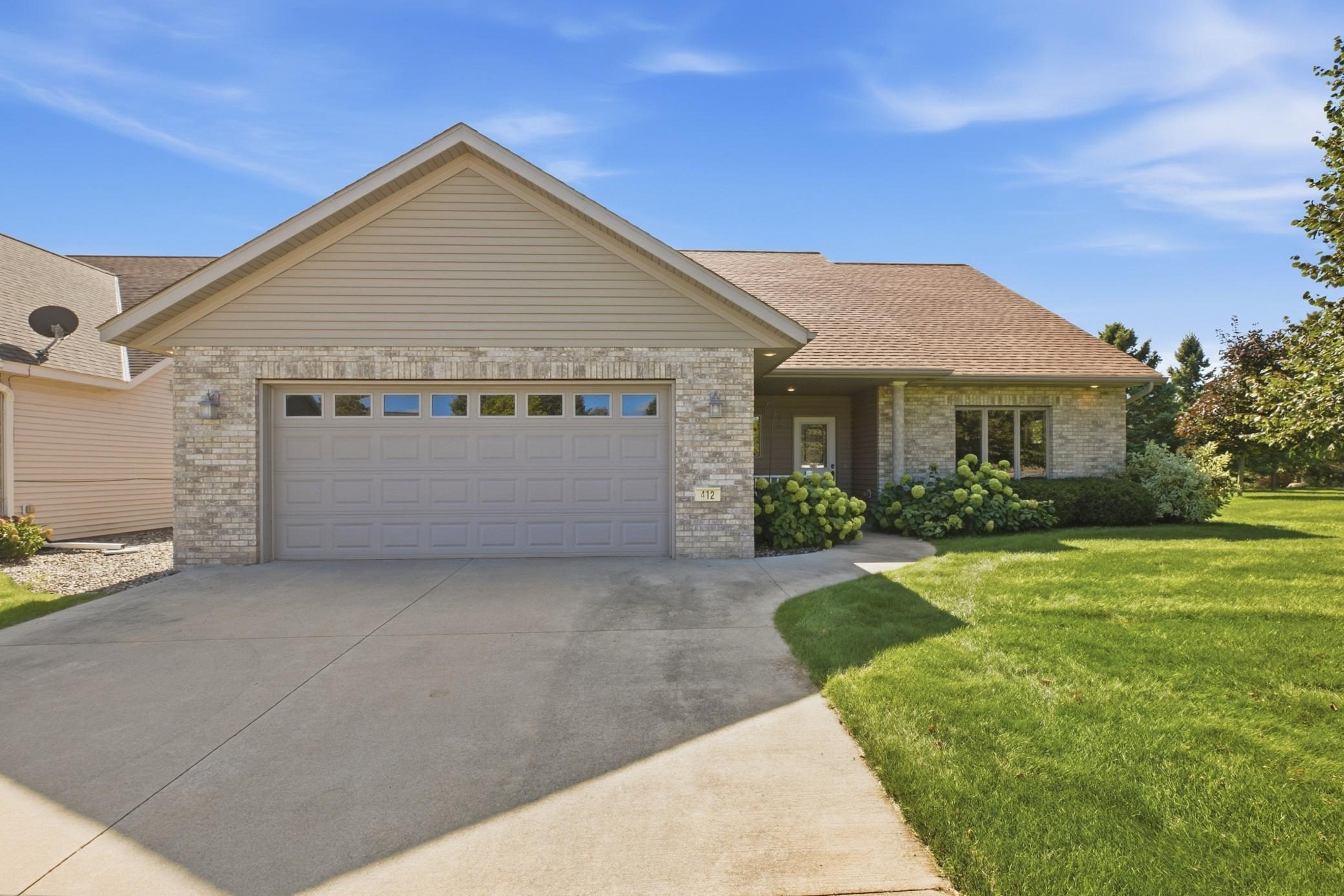Looking for your ideal single-level home? This charming home is sure to impress. Located in the idyllic North Pointe neighborhood of Cold Spring, this 2 bedroom, 2 bathroom home features a thoughtful layout with zero interior or exterior steps for accessible living. You'll find heated floors throughout, vaulted ceilings, a gas fireplace and a convenient main floor laundry room with ample storage. The primary bedroom includes a generous walk in closet and an ensuite bathroom. Outside you'll find mature trees, green space and a back patio ready for hosting. Enjoy peace of mind as the HOA maintains lawn care, snow removal and the in ground irrigation system. Complete with a finished 2 car garage, this home is ready for you!