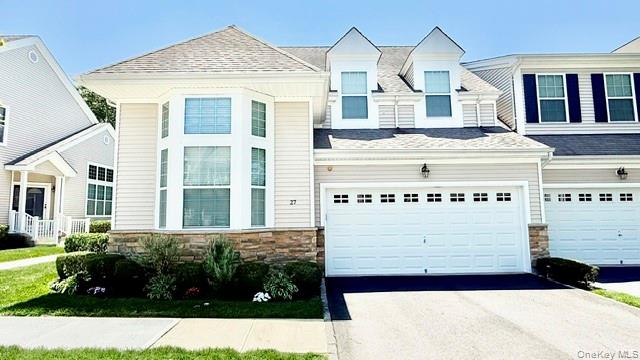 Luxurious And Sought After End Unit Condominium in The Gated 55+ Community At The Vineyards!  The Chablis Model Offers 2335 Sq Ft. Of Fabulous Living Space!  Original Owners! Unbelievable Open Floor Plan With Soaring Ceilings And Tons Of Natural Light, Desirable End Unit, Front Entrance Gives Way To Entry Foyer With Soaring Ceilings, Floor To Ceiling WIndows, Make Way To A Formal Dining Room Spacious Enough For Entertaining, A Cozy Living Room/Den With Gas Fireplace For Ambiance, Huge Eat In Kitchen With Separate Dining Area, Breakfast Bar, Endless Granite Countertops, Custom Cabinetry With Pullouts For Storage, Updated Stainless Steel Appliances, Separate Laundry Room Off Kitchen Includes Ample Cabinets And Hugh Storage Closet, Spacious Half Bath Powder Room On First Floor, Enormous Primary Bedroom Suite Includes Floor To Ceiling Windows With Soaring Ceilings And Updated Ensuite Bathroom, Enclosed Walk In Glass Shower, Double Vanity, Corner Whirlpool Tub, Custom Tile, Double His & Hers Walk In Closets And Additional Closet All With Custom Closet Systems!  The Grand Two Story Foyer To Staircase Leading Up To A Generous Sized Loft With Endless Possibilities And Overlooks The First Level, Second Level Includes A Spacious  Bedroom With Double Closets And Spacious En-suite Bathroom, Bonus Room On Second Level Has Endless Possibilities- A Third Bedroom, Office or Private Workout Room, Sliding Doors From First Level Kitchen Lead to An Amazing Covered Maintenance Free Trex Deck, Which Leads To A Paver Patio With Electric Awning And Overlooks A Natural Serene Buffer of Trees And Shrubs For Your Quiet Enjoyment, Attached 2 Car Garage, Enormous Full Basement, This Gated Community Offers A Recently Renovated Clubhouse, Heated In-Ground Salt Water Pool, Tennis/Pickleball Court, Fitness Center, Bocce Ball, Business Center, 24 Hour Gated Security, A Gateway To The Hamptons!, Conveniently Located Near Beach, Boating, Fishing Marinas And Major Roadways, Come Make This Wonderful Condo And Community Your Own!!